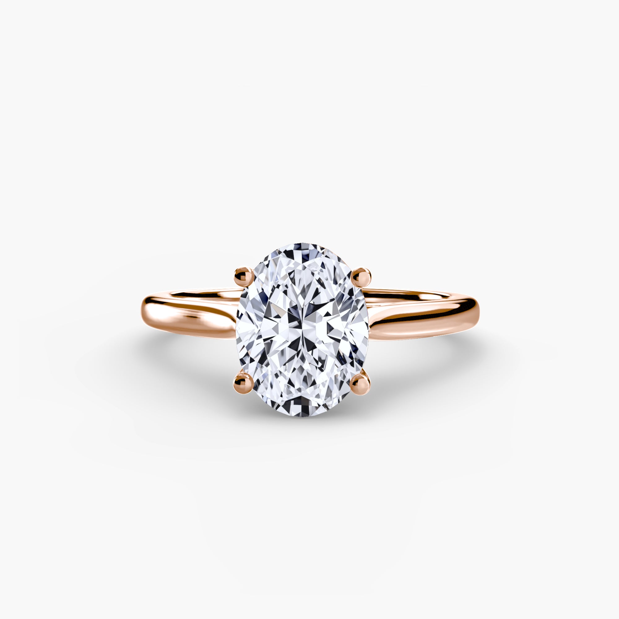 The MICHAEL ISAAC Solitaire ring 1 features a large oval-cut diamond in a classic four-prong rose gold setting, showcased on a plain white background.