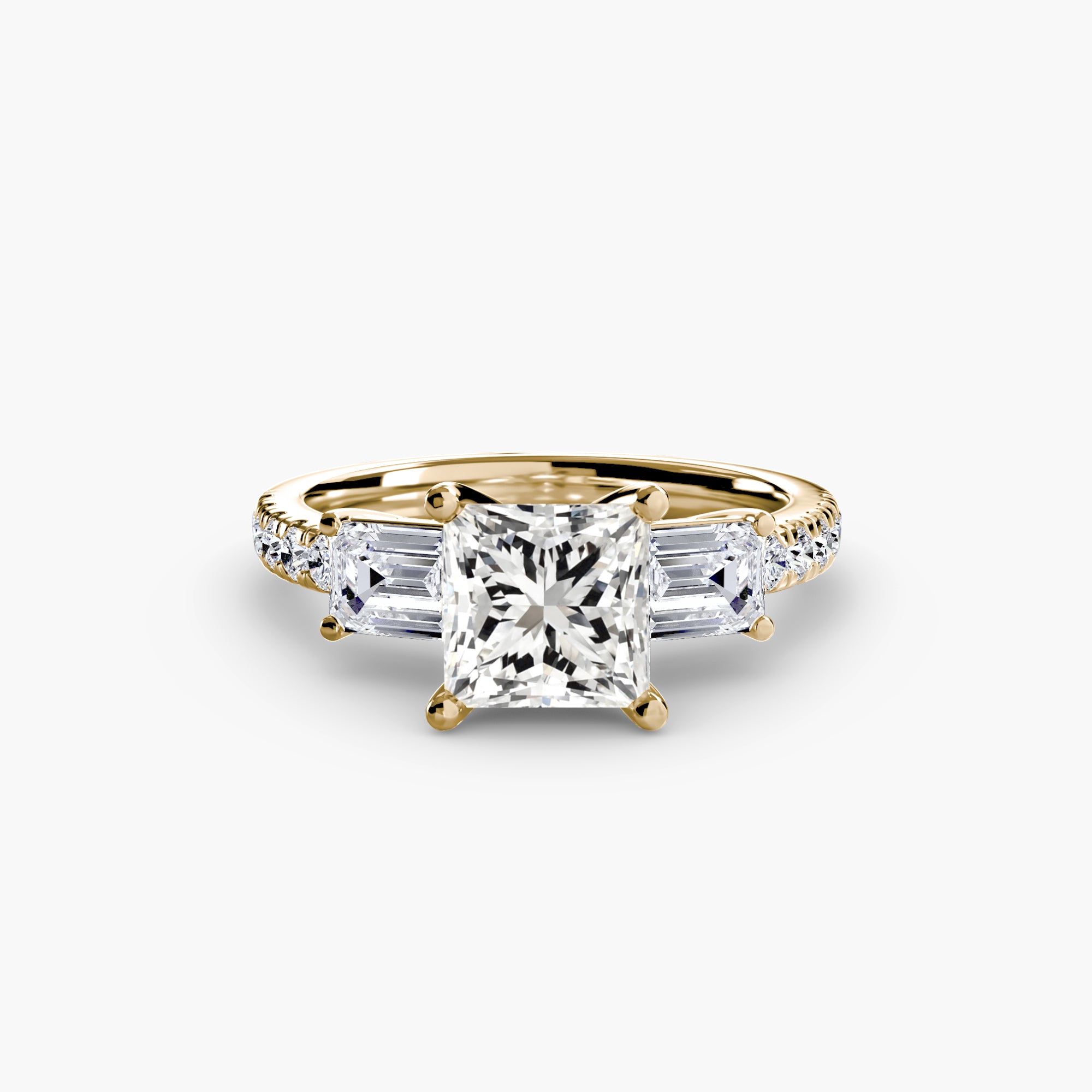 The MICHAEL ISAAC Three-Stone Ring with Pavé Band 4 showcases a striking square-cut diamond center, flanked by two trapezoid diamonds and completed with pavé-set diamonds along the gold band.
