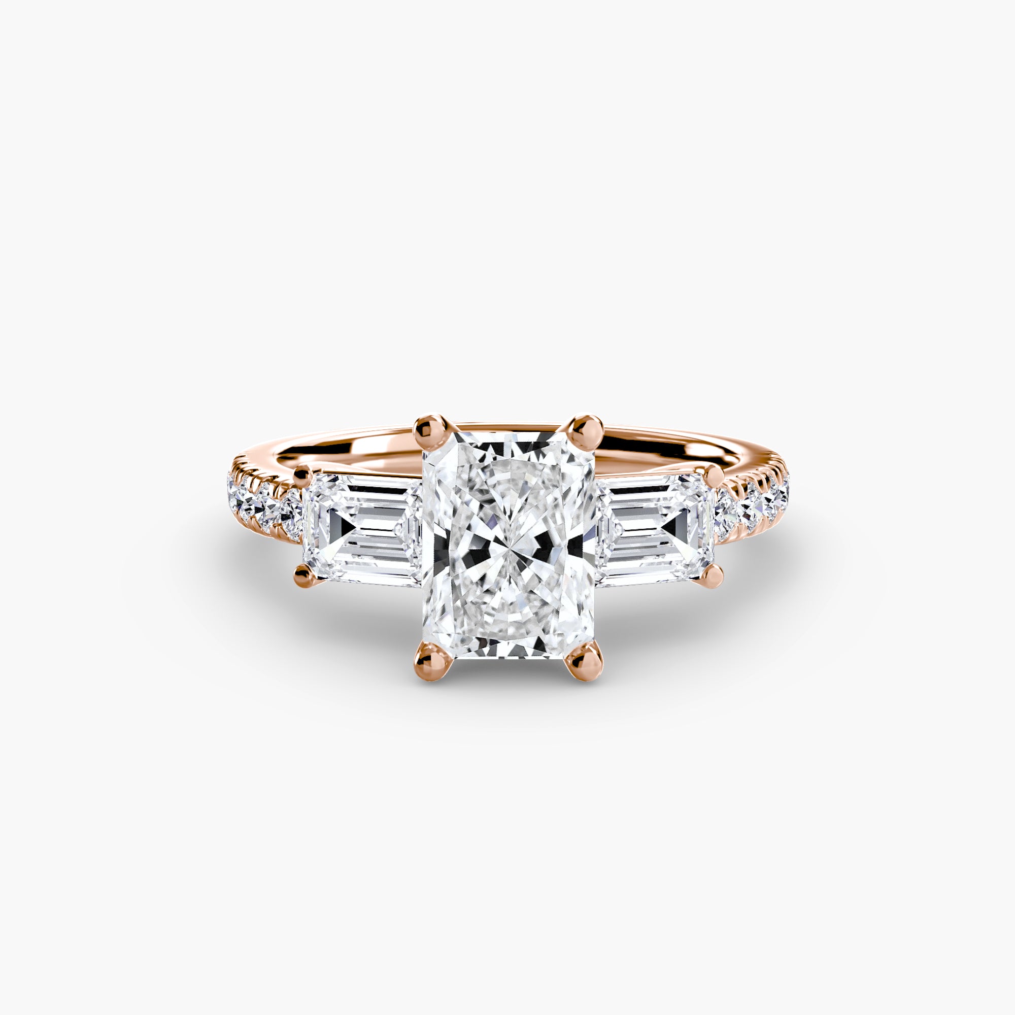 The MICHAEL ISAAC Three-Stone Ring with Pavé Band 4 features a large cushion-cut diamond center, tapered baguette side stones, and pavé round diamonds on the band, shown against a white background.