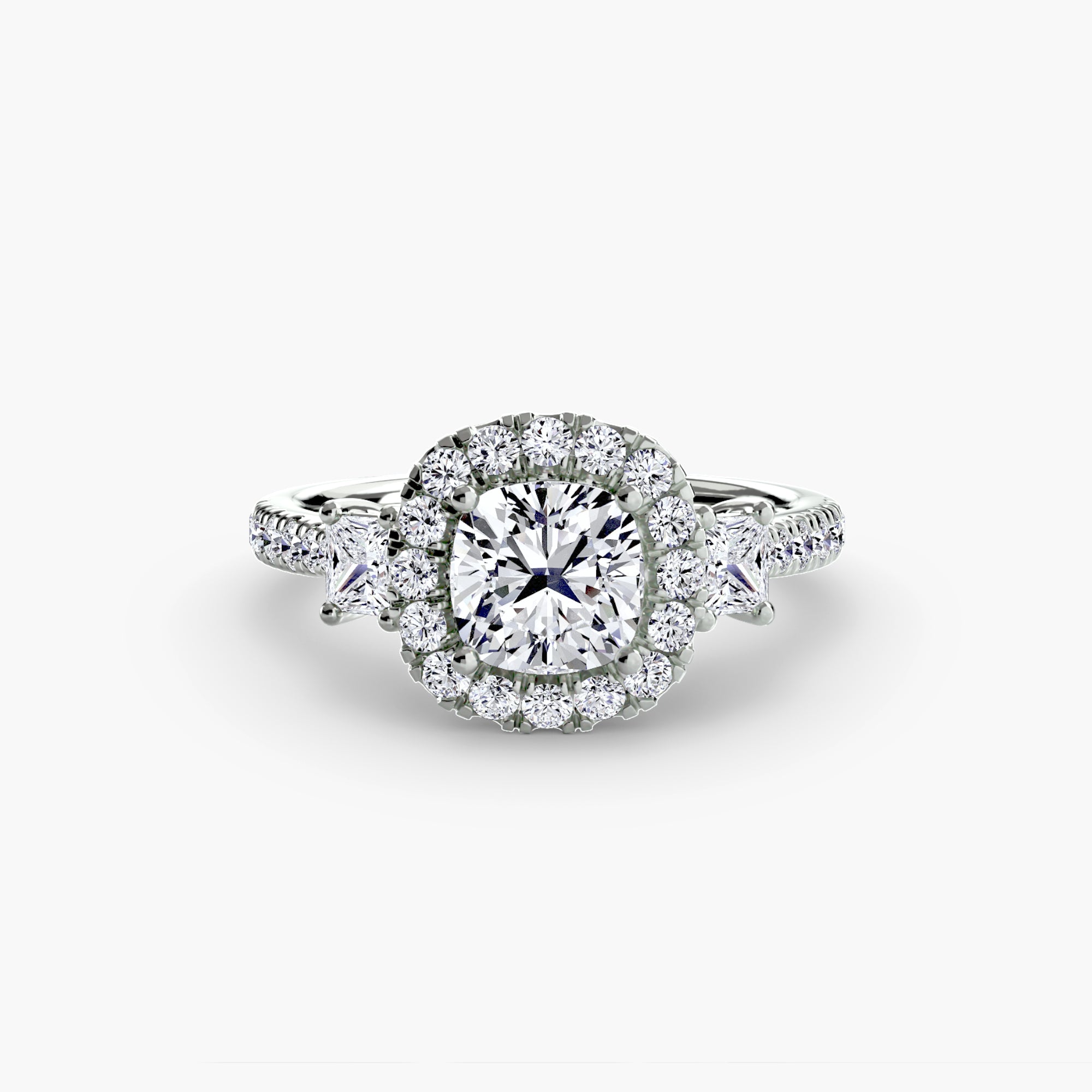 The MICHAEL ISAAC Three-Stone Ring with Halo 2 features a large round center diamond, radiant halo of smaller diamonds, and a diamond-encrusted band, displayed on a white background.