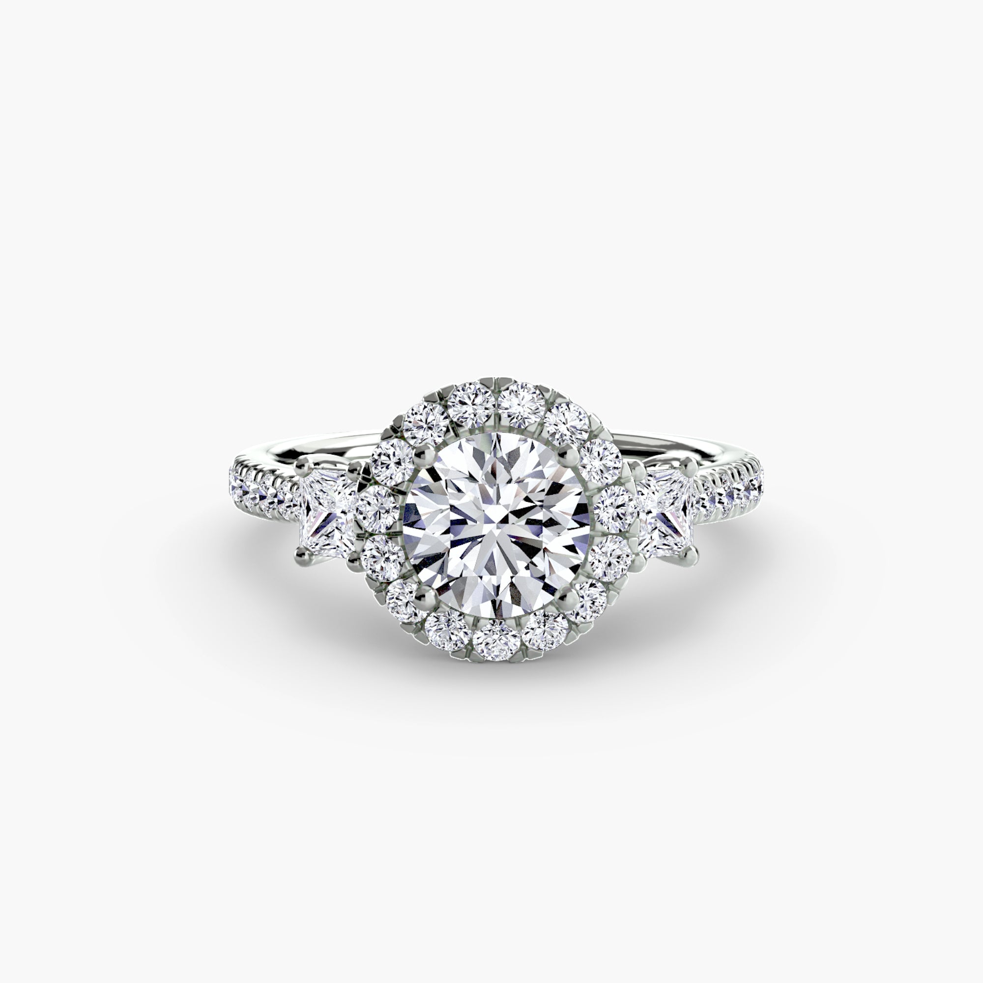 The MICHAEL ISAAC Three-Stone Ring with Halo 2 features a modern silver design with a large round center diamond, halo accents, and additional diamonds along the band.