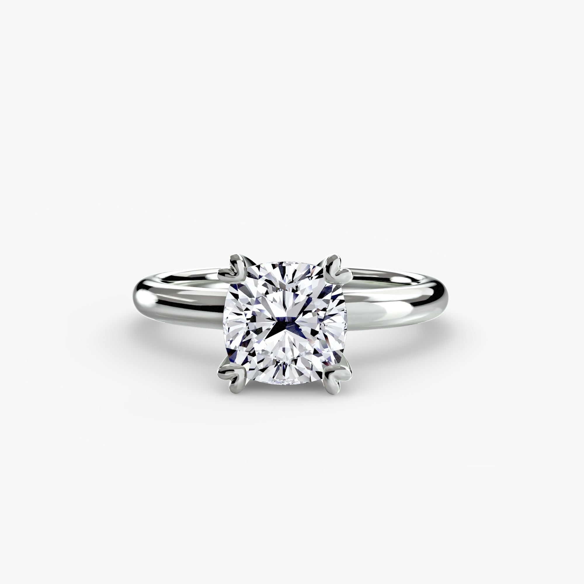 The MICHAEL ISAAC Solitaire ring 2 features a cushion-cut diamond in a classic four-prong setting, ideal for minimalist style lovers, shown on a plain white background.
