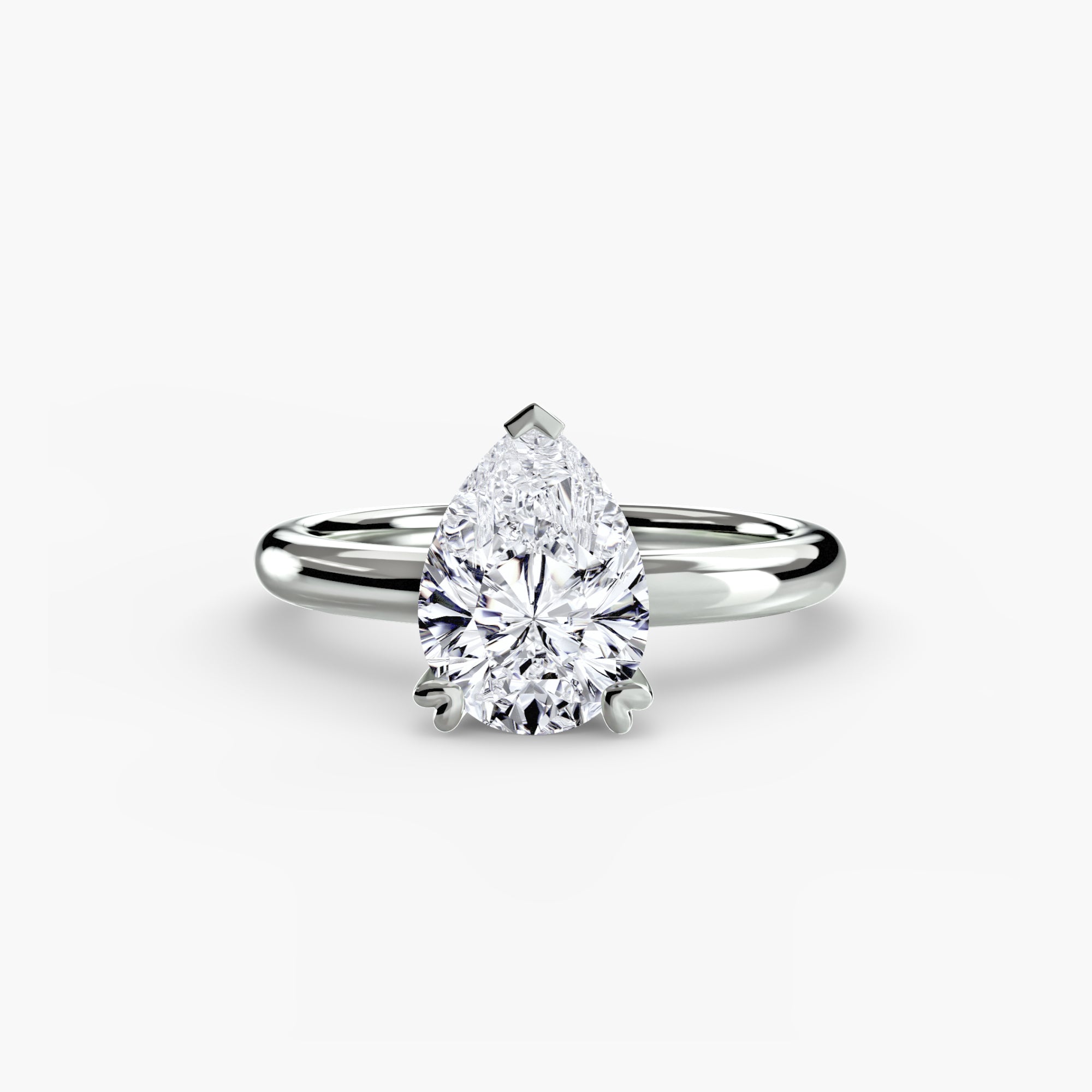 The MICHAEL ISAAC Solitaire ring 2 features a pear-shaped diamond solitaire in a classic setting with a polished silver band, displayed against a plain white background.
