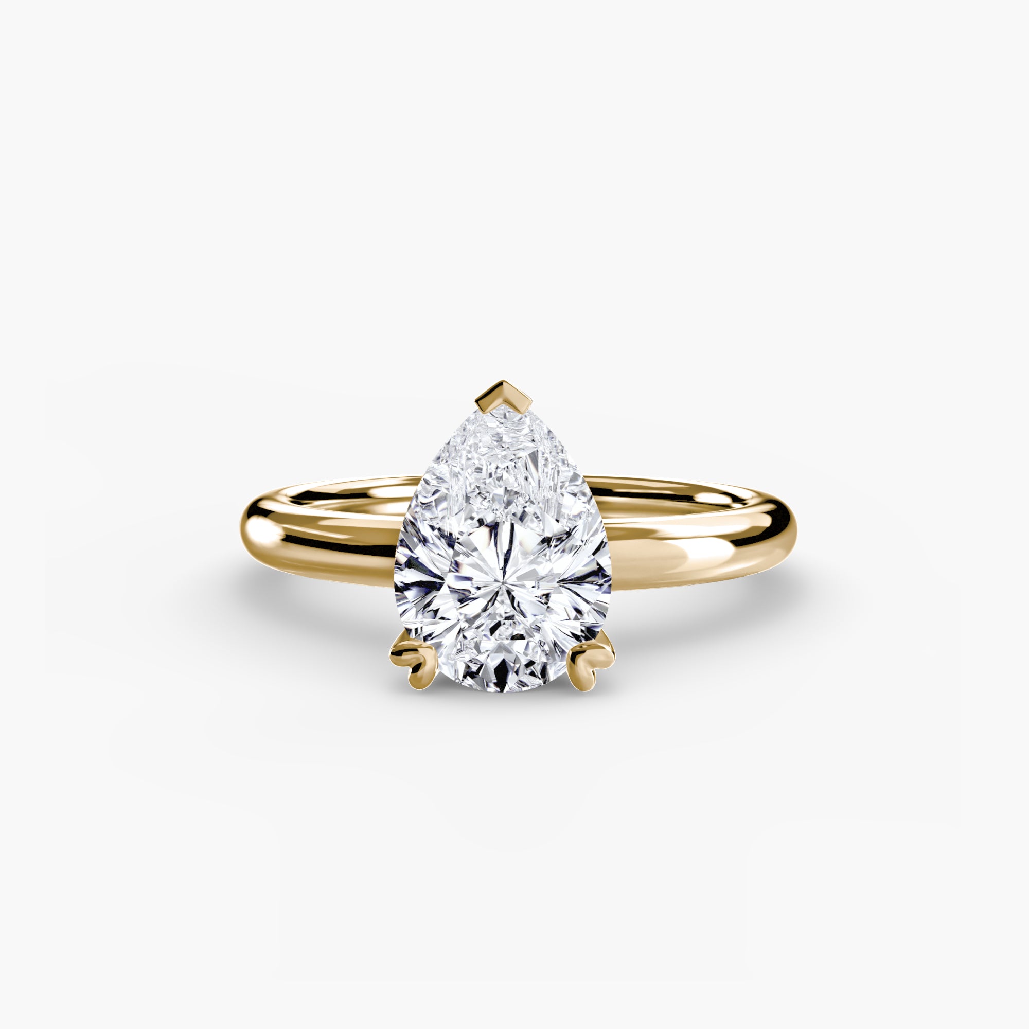 The MICHAEL ISAAC Solitaire ring 2 features a large, pear-shaped diamond in a classic gold solitaire setting, shown on a plain white background.