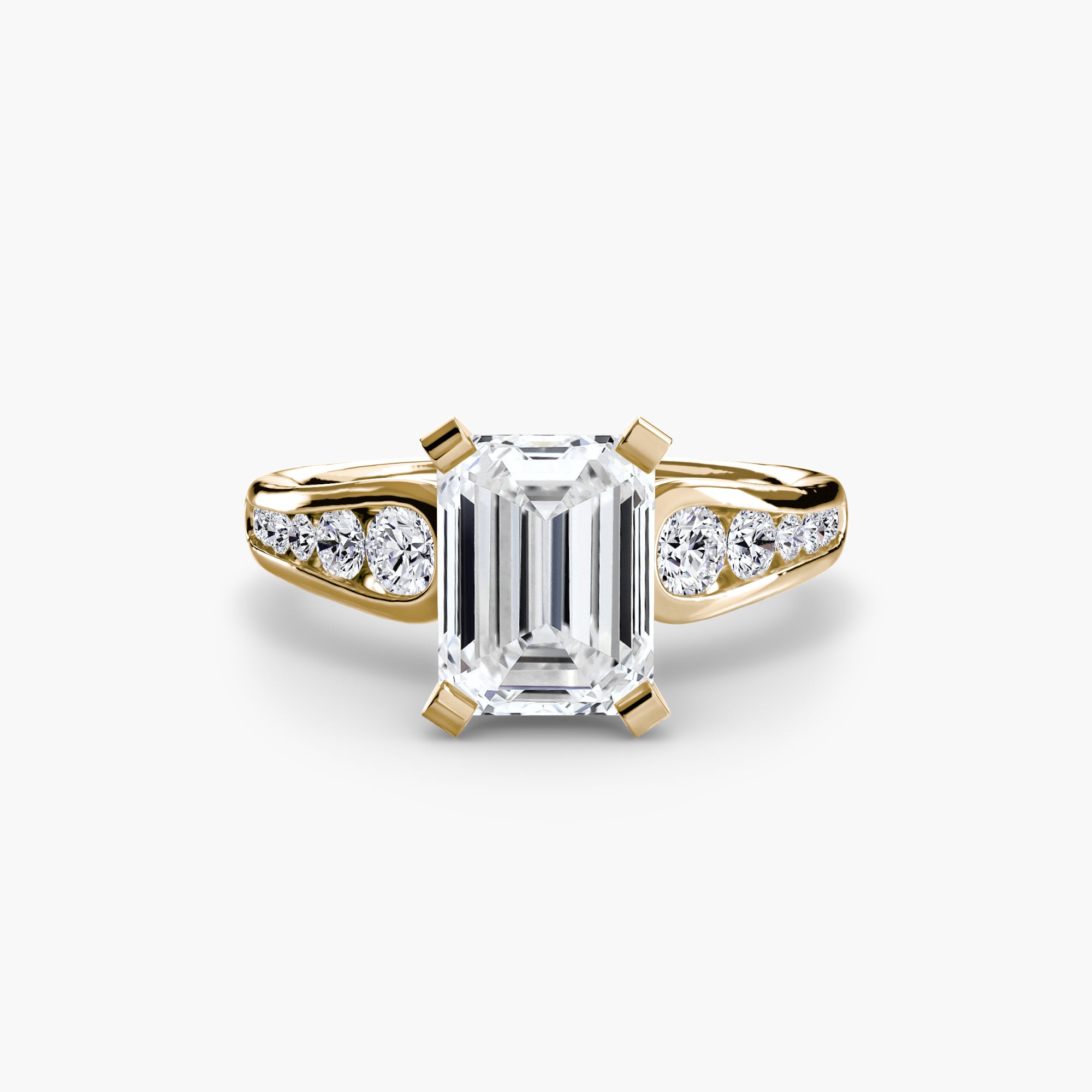 The Solitaire with Pavé 2 ring by MICHAEL ISAAC features a large emerald-cut diamond center, accented by three pavé-set round diamonds on each side, all set in gold and shown against a white background for a touch of everyday luxury.