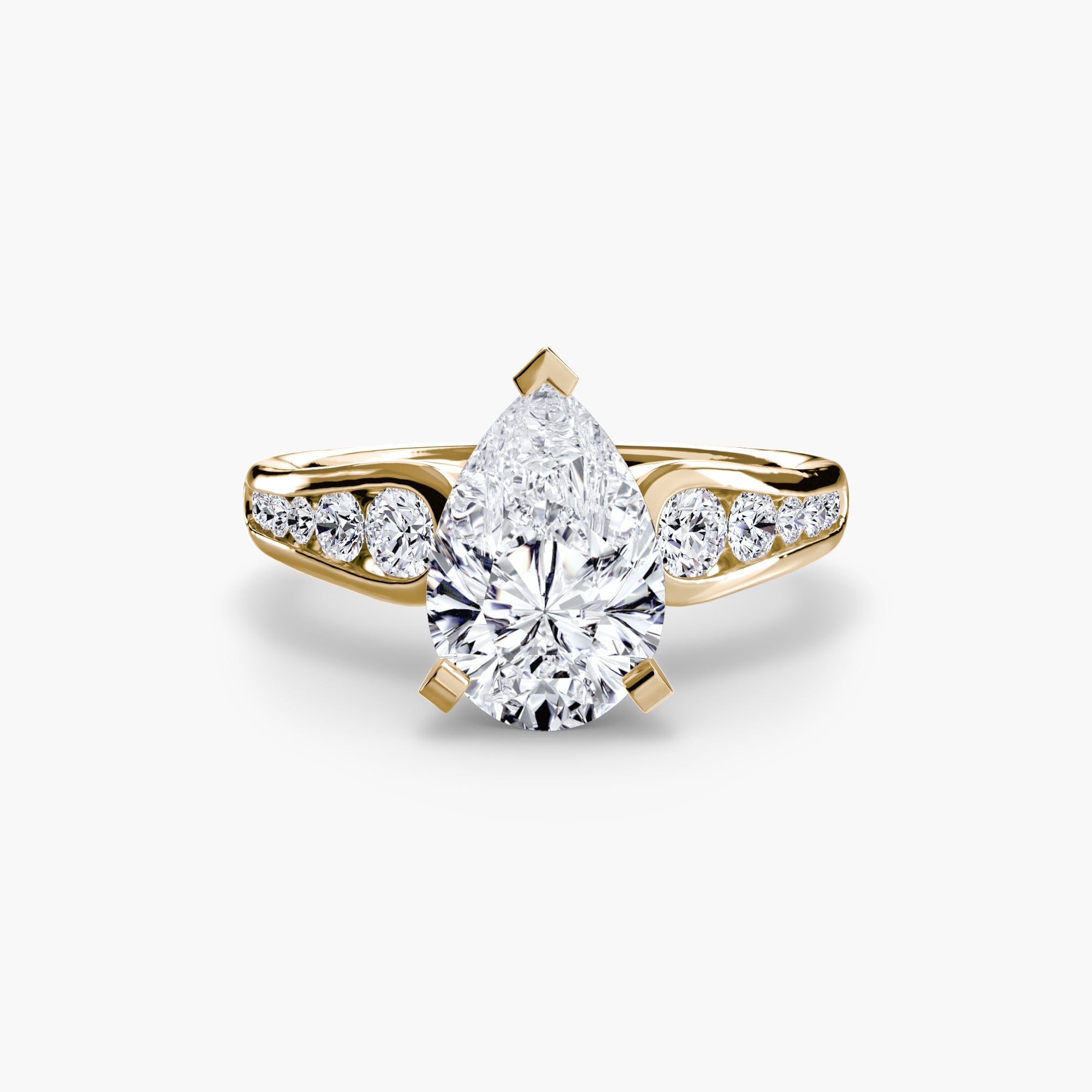 The Solitaire with Pavé 2 by MICHAEL ISAAC is a gold ring with a large, pear-shaped diamond center, flanked by round diamonds on a pavé-set band—an elegant piece for everyday luxury, displayed against a white background.