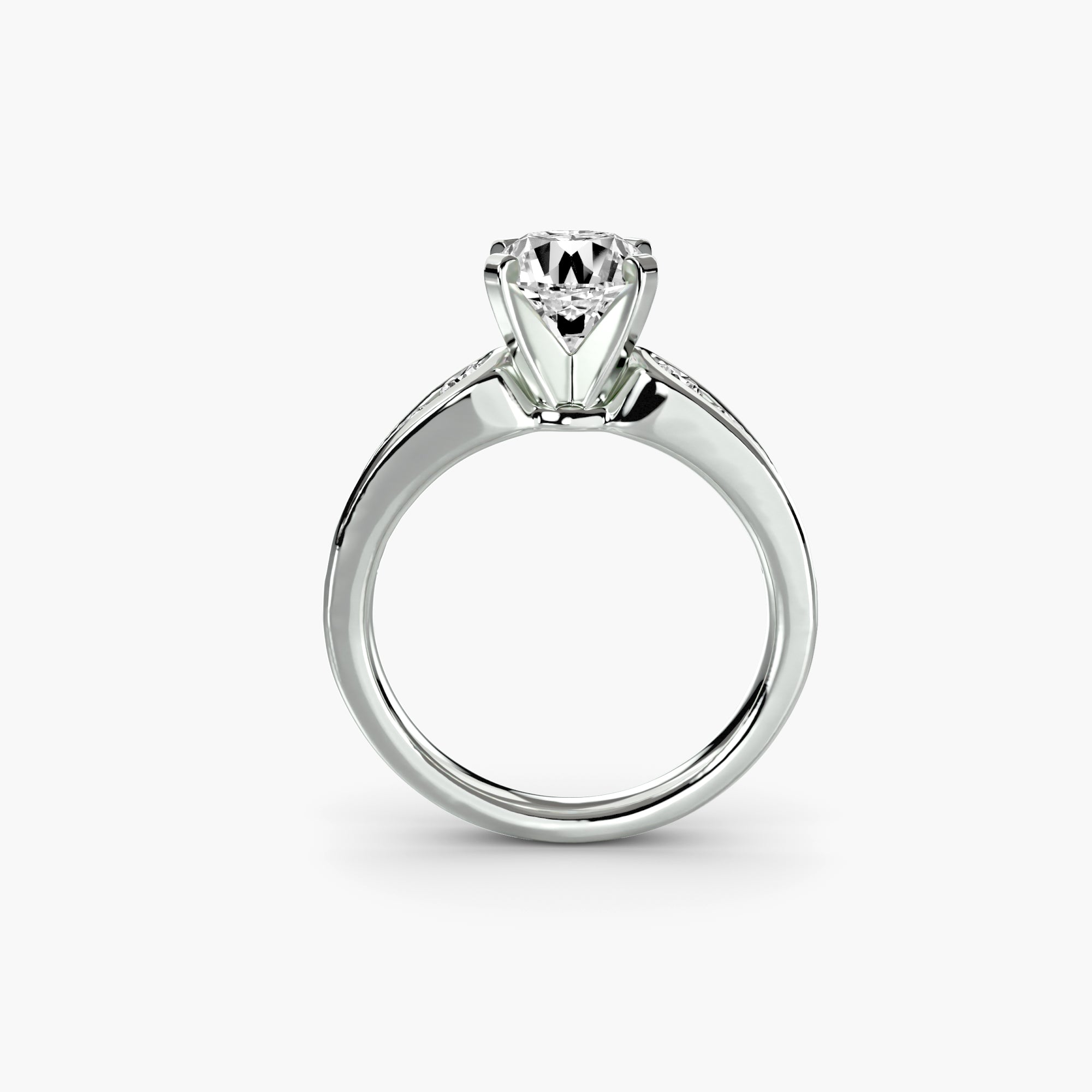 The MICHAEL ISAAC Solitaire with Pavé 2 ring showcases a brilliant round diamond in a raised prong setting for timeless elegance, making it an ideal everyday luxury piece, shown on a plain white background.