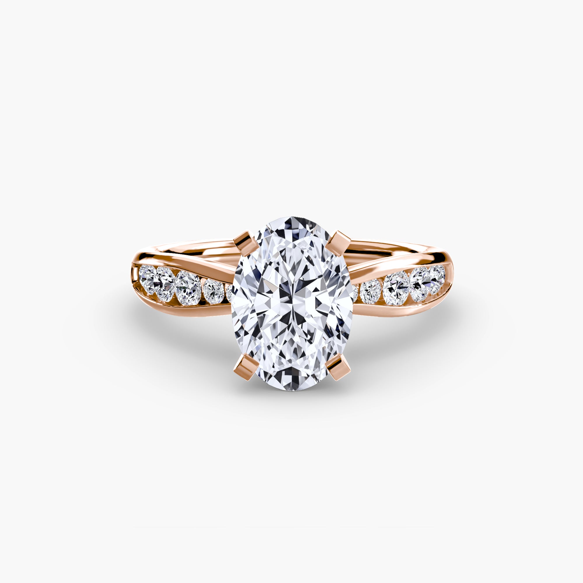 The MICHAEL ISAAC Solitaire with Pavé 3 features an oval-cut center diamond and pavé-set round diamonds along a rose gold split band, offering a touch of everyday luxury.