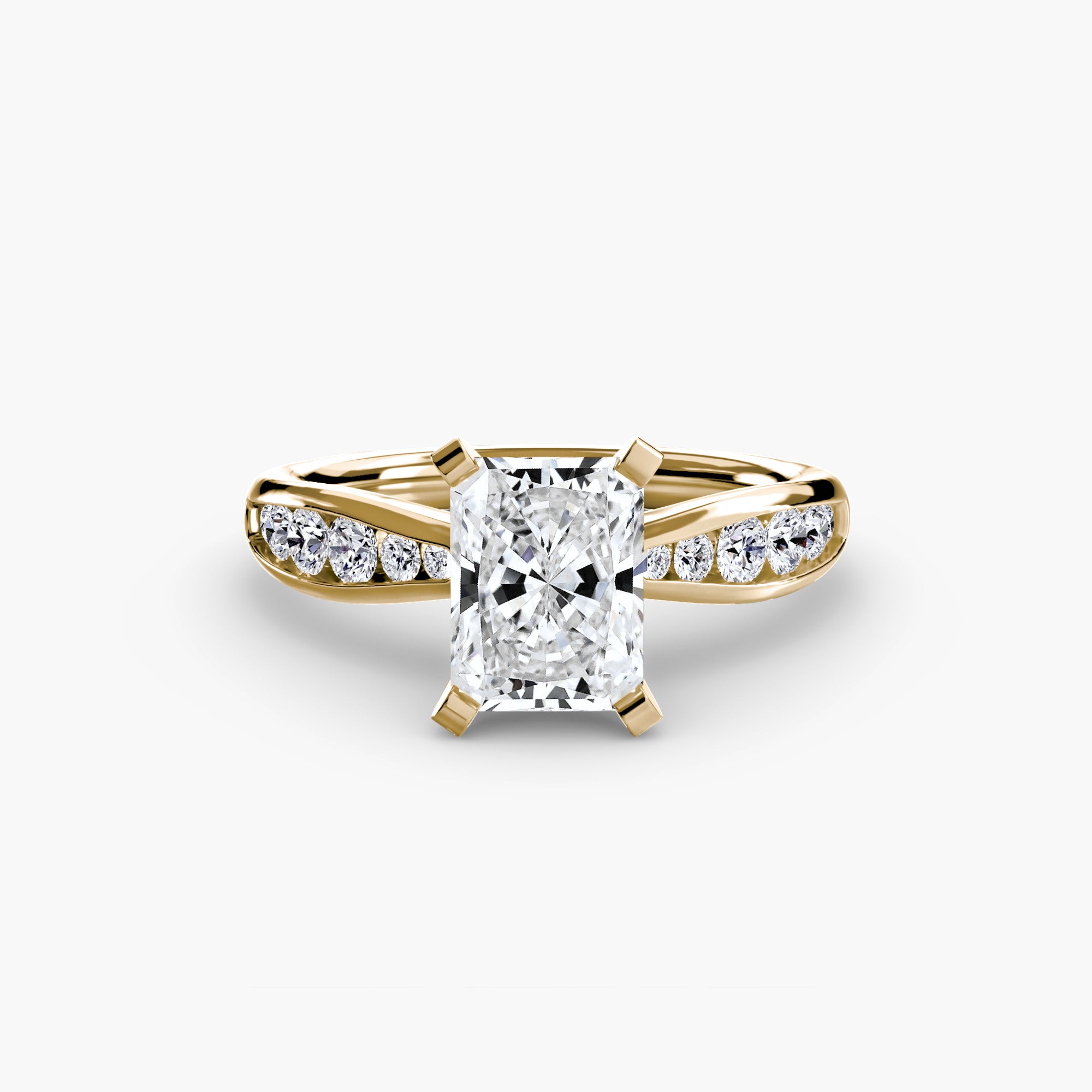 The MICHAEL ISAAC Solitaire with Pavé 3 is a gold engagement ring featuring a radiant-cut center diamond in a four-prong setting and a pavé-set band of round diamonds for an elegant touch.