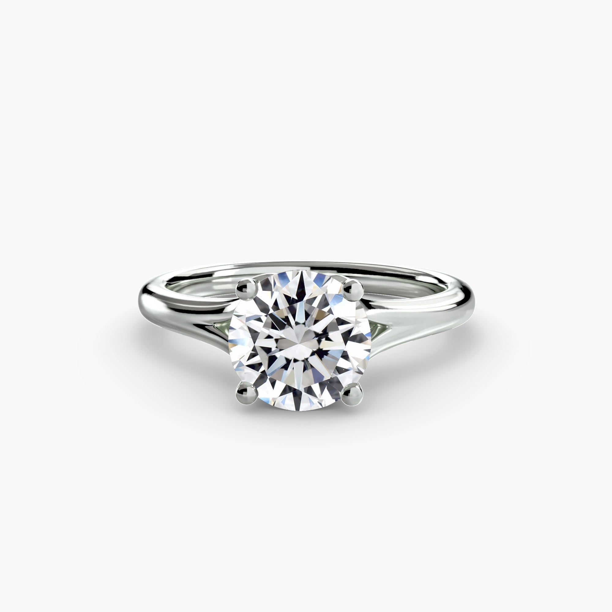 The MICHAEL ISAAC Solitaire ring 4 features a round, brilliant-cut diamond in a classic four-prong silver setting, shown on a white background.