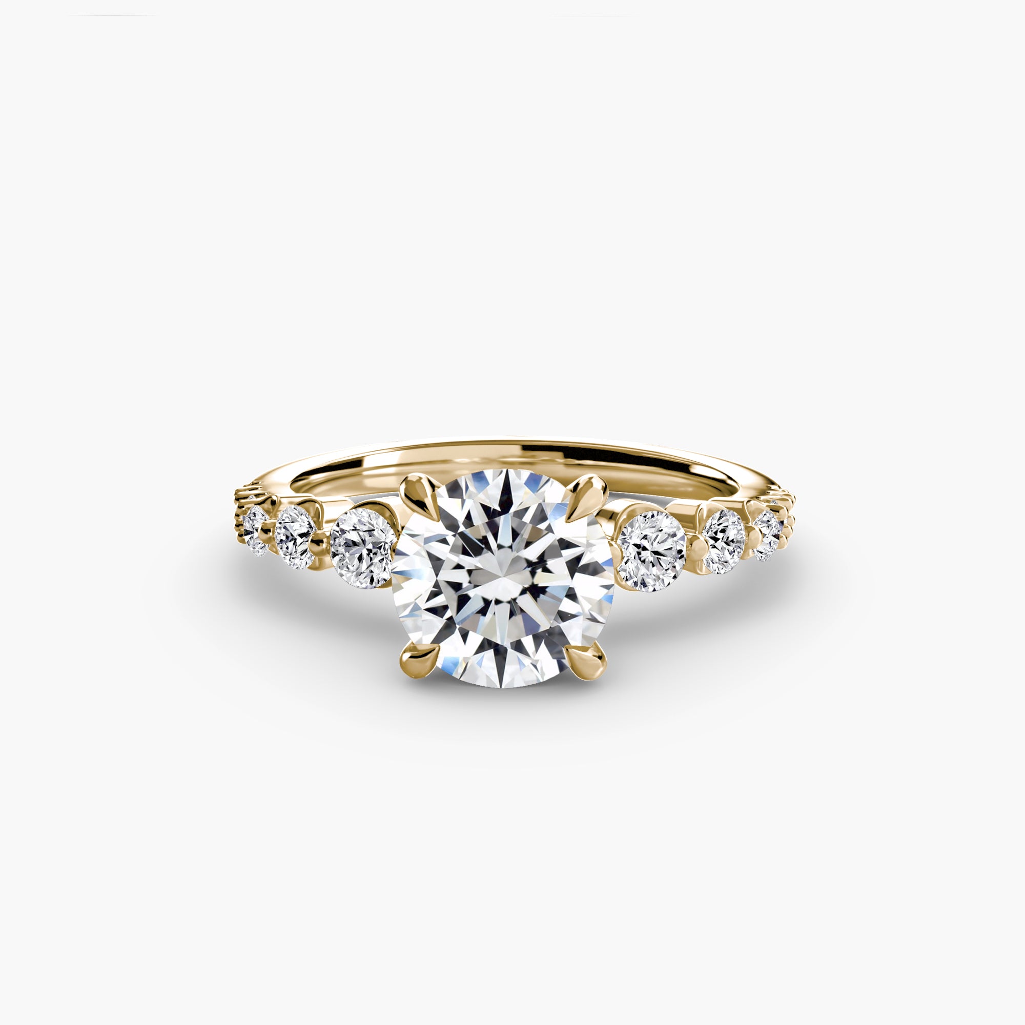 The Cascade Diamond Ring by MICHAEL ISAAC features a 1.5 ct round center diamond on a gold band, accented with three sparkling side stones on each side, beautifully showcased on a plain white background.