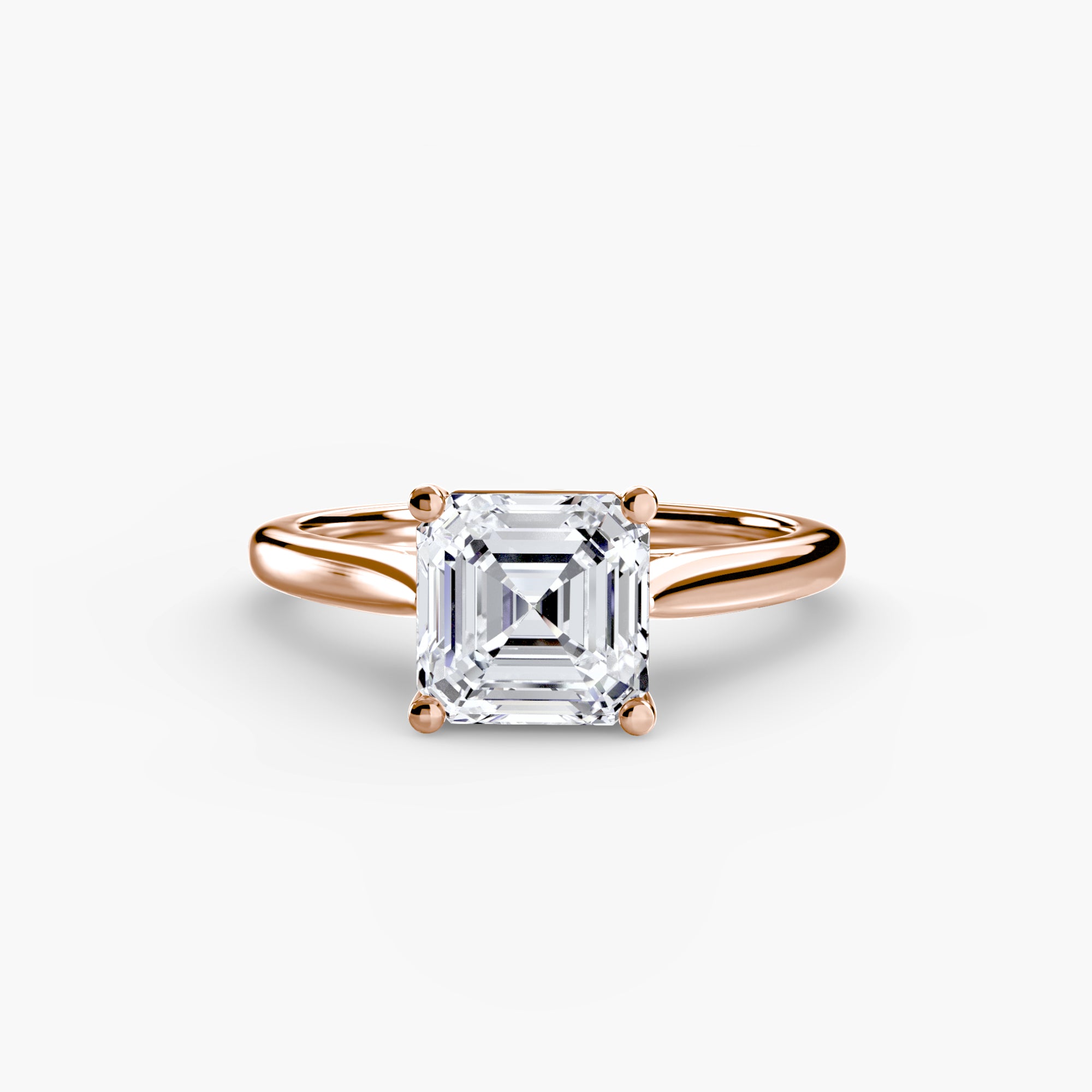 The Solitaire ring 1 by MICHAEL ISAAC features a large square-cut diamond in a classic four-prong gold setting, shown on a plain white background—ideal for those who appreciate timeless, minimalist design.