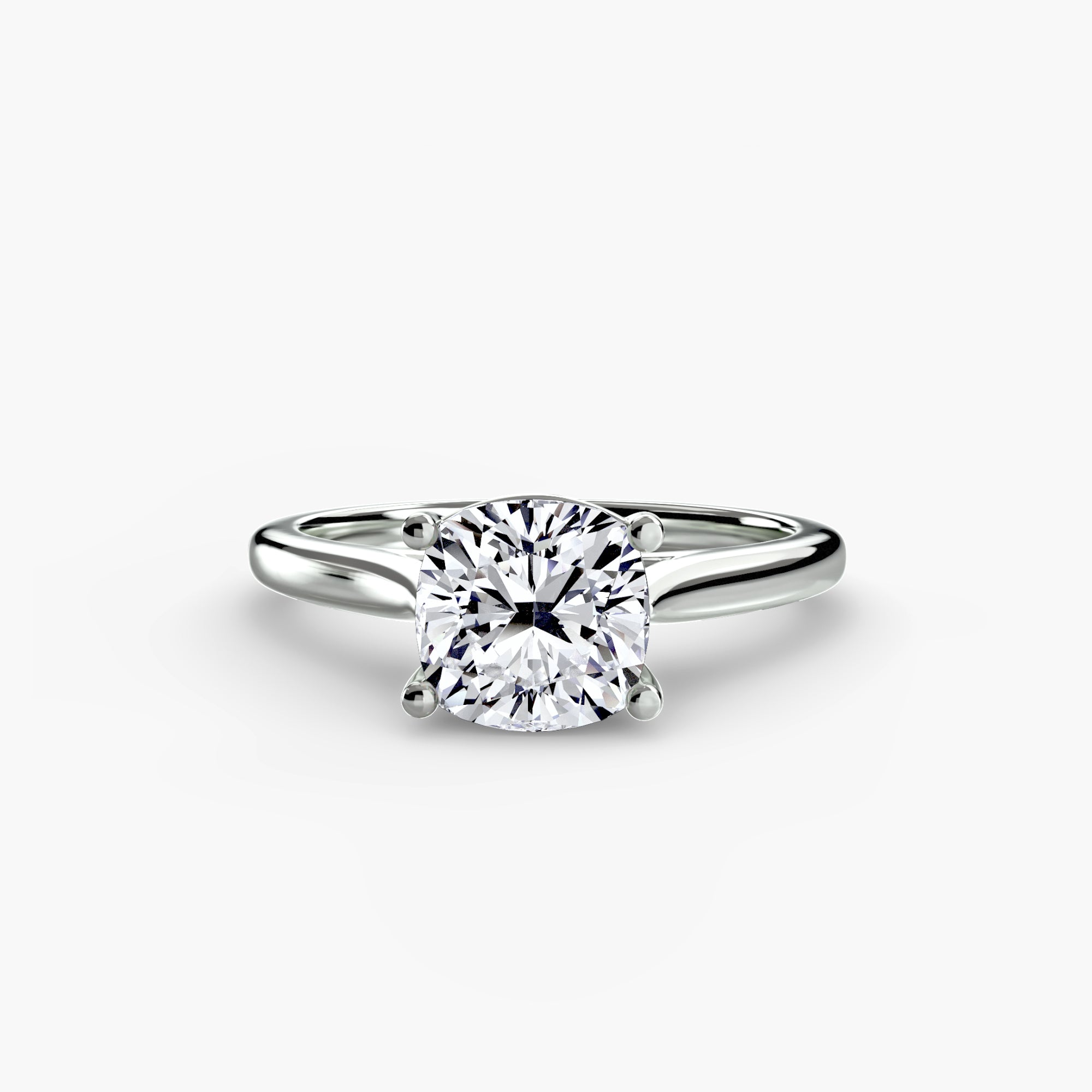 The MICHAEL ISAAC Solitaire ring 1 features a classic silver setting with a round, brilliant-cut diamond secured by four prongs, shown against a plain white background.