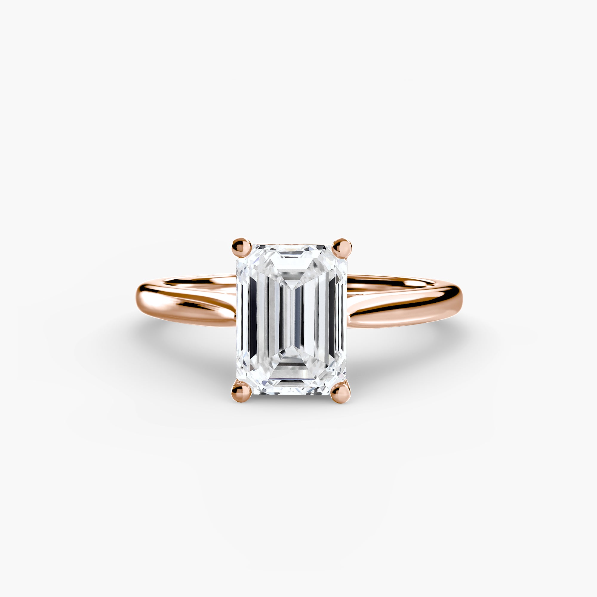 The MICHAEL ISAAC Solitaire ring 1 is a rose gold ring with a large emerald-cut diamond in a classic four-prong setting, shown on a plain white background.