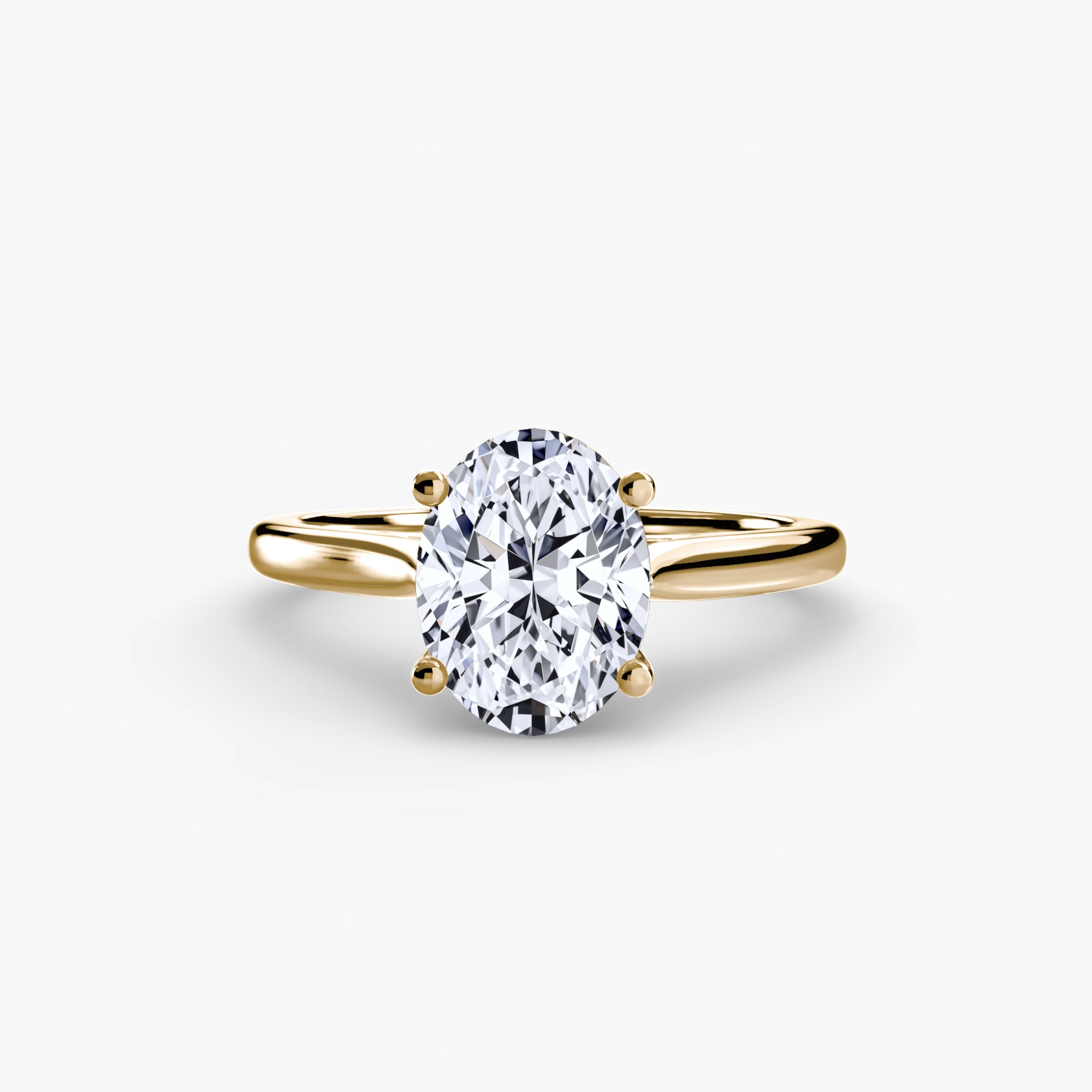 The MICHAEL ISAAC Solitaire ring 1 features a single oval-cut diamond in a classic four-prong gold setting, shown against a plain white background.