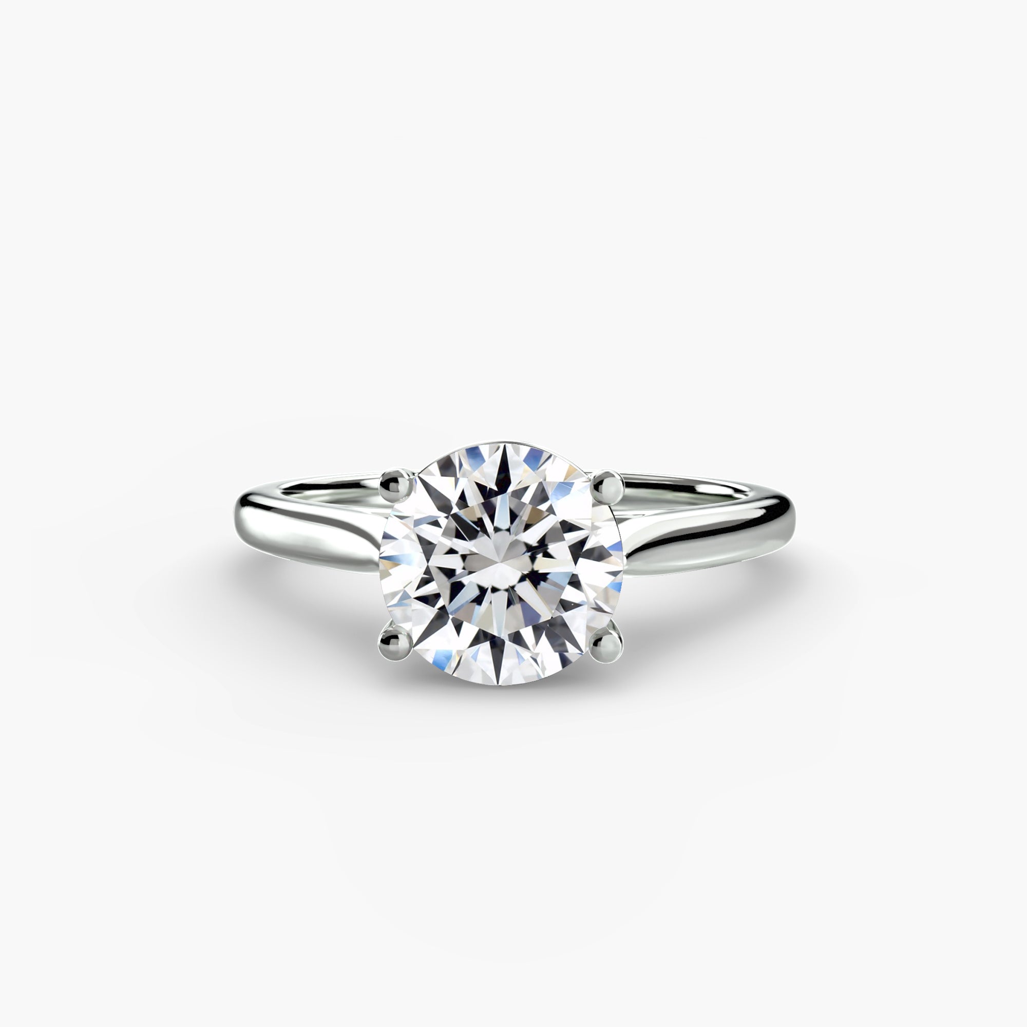 The MICHAEL ISAAC Solitaire ring 1 features a large, round-cut diamond in a classic four-prong silver setting, showcased on a plain white background.