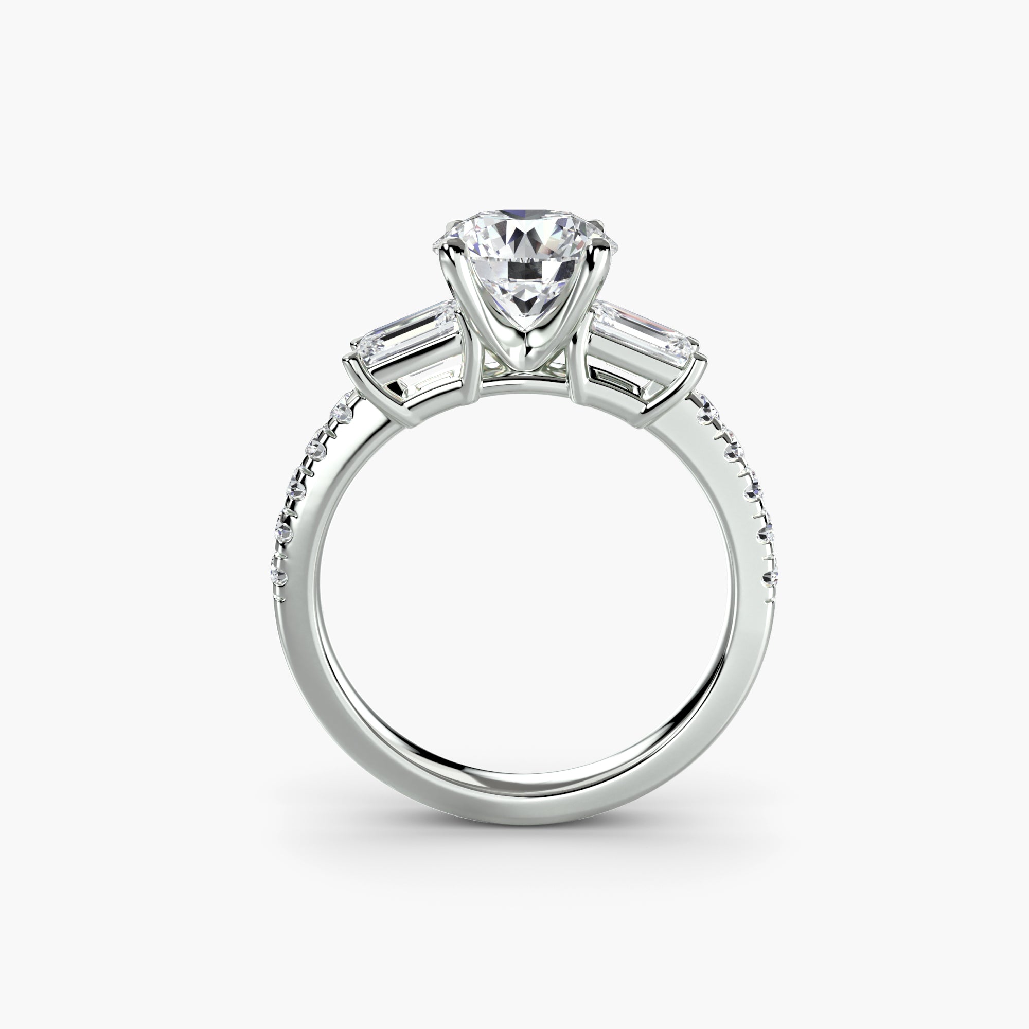 The MICHAEL ISAAC Three-Stone Ring with Pavé Band 4 features a large center triangular diamond, two baguette-cut side diamonds, and pavé-set diamonds along the band for a stunning, elegant look.