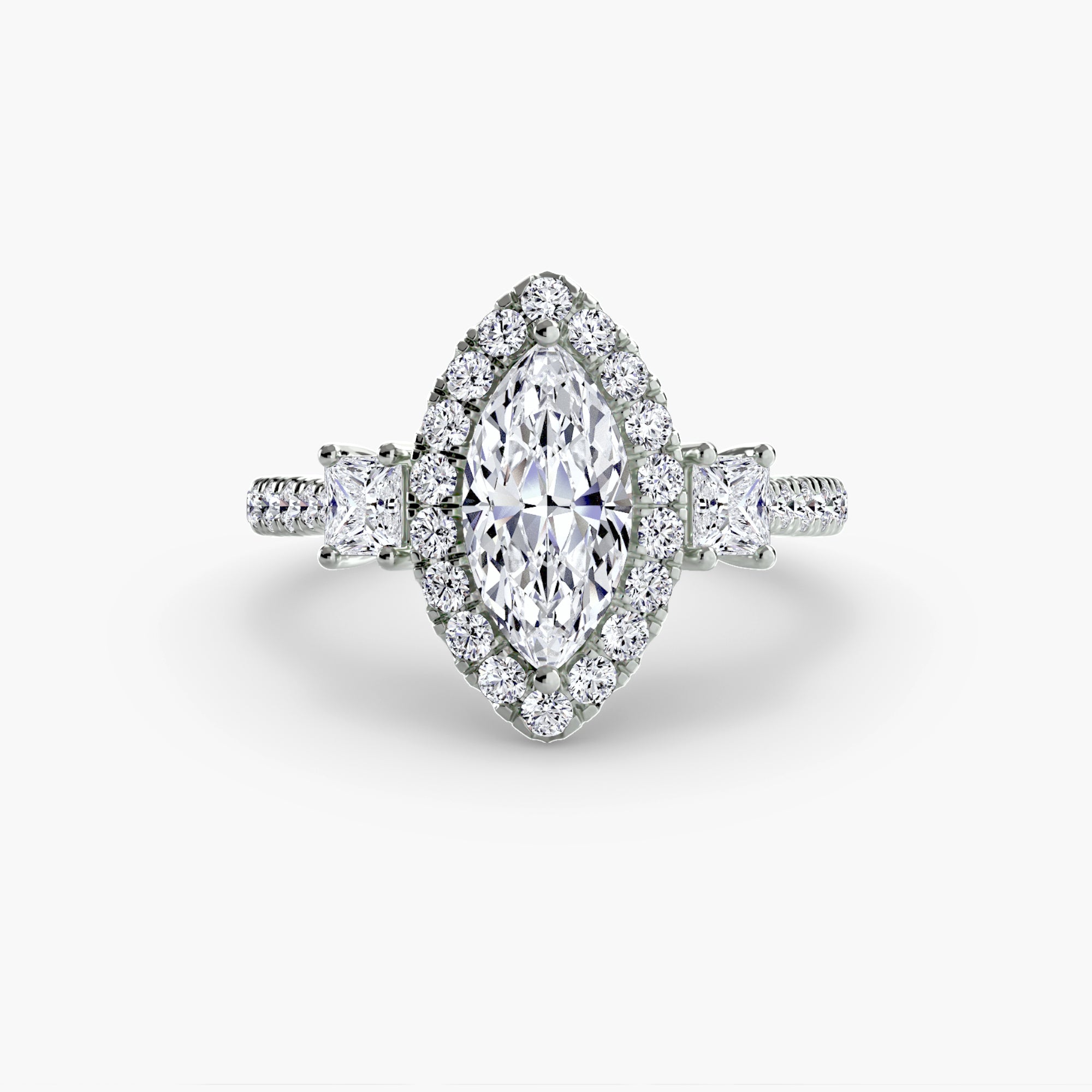 The MICHAEL ISAAC Three-Stone Ring with Halo 2 features a marquise-cut diamond, radiant halo, trapezoid side stones, and additional diamonds on a white gold band for a modern take on the classic three-stone ring.