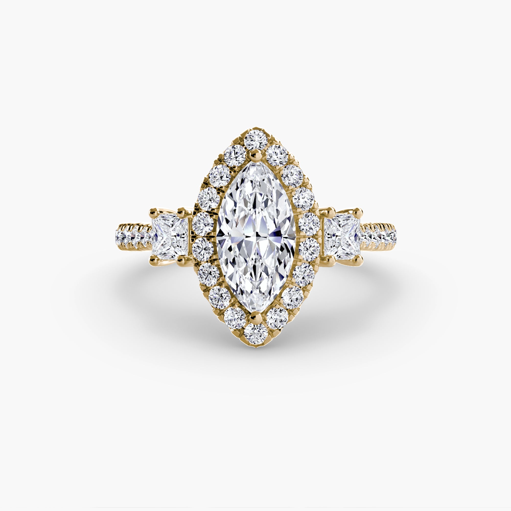 The MICHAEL ISAAC Three-Stone Ring with Halo 2 features a marquise-cut diamond, yellow gold band, radiant diamond halo, and additional accent diamonds on the band, beautifully displayed against a white background.