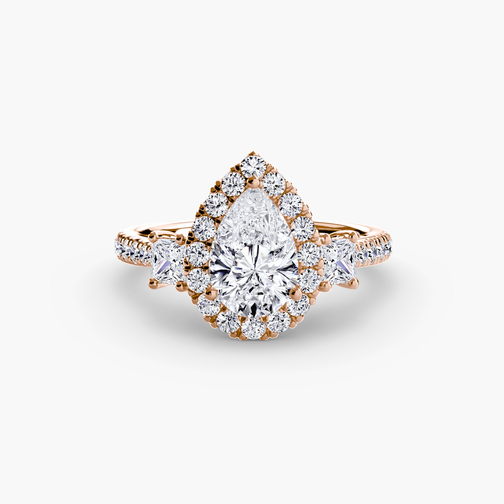 The MICHAEL ISAAC Three-Stone Ring with Halo 2 showcases a stunning pear-shaped diamond center, haloed by radiant diamonds and accented with more diamonds along the rose gold band.