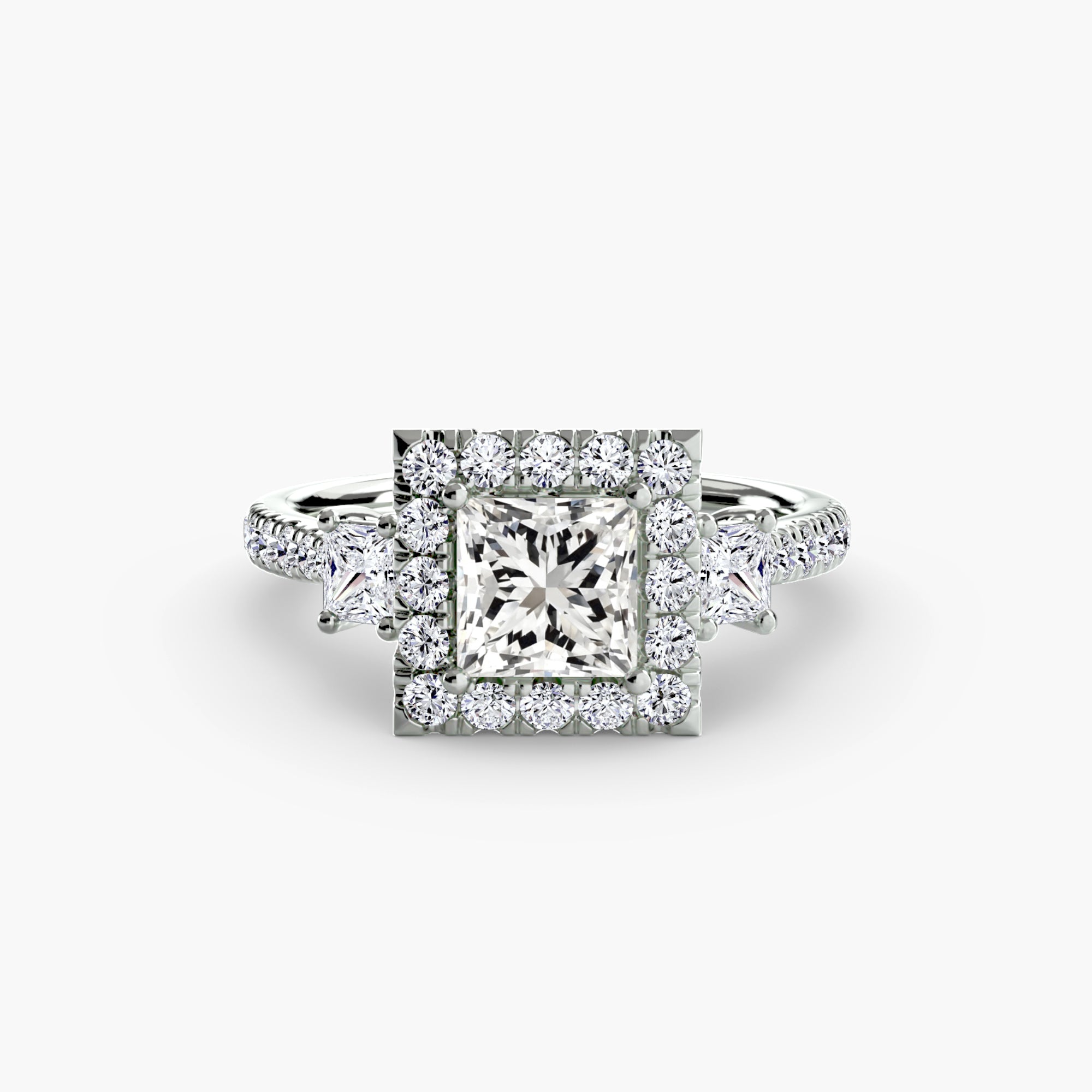 The MICHAEL ISAAC Three-Stone Ring with Halo 2 features a square-cut center diamond, a halo of round diamonds, and two star-shaped side diamonds for a modern look.