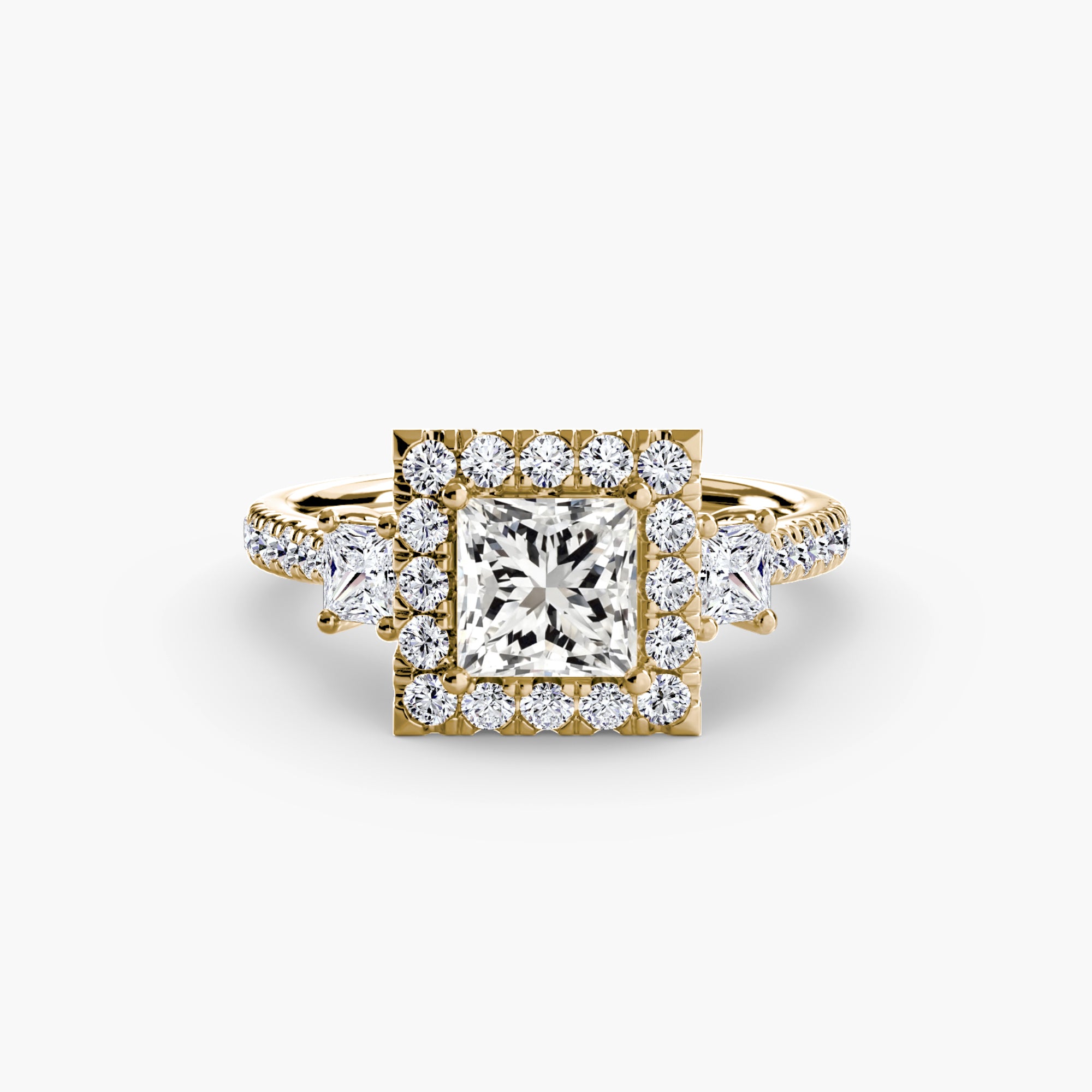 The MICHAEL ISAAC Three-Stone Ring with Halo 2 showcases a striking square-cut center diamond, surrounded by a halo of round diamonds and accented with additional diamonds along the gold band.