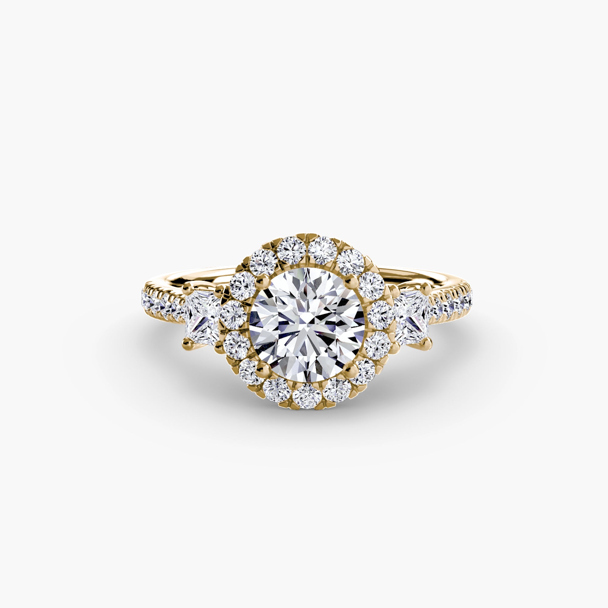 The MICHAEL ISAAC Three-Stone Ring with Halo 2 features a round center diamond in a radiant halo, two large side stones, and a diamond-adorned band—a modern take on classic elegance.