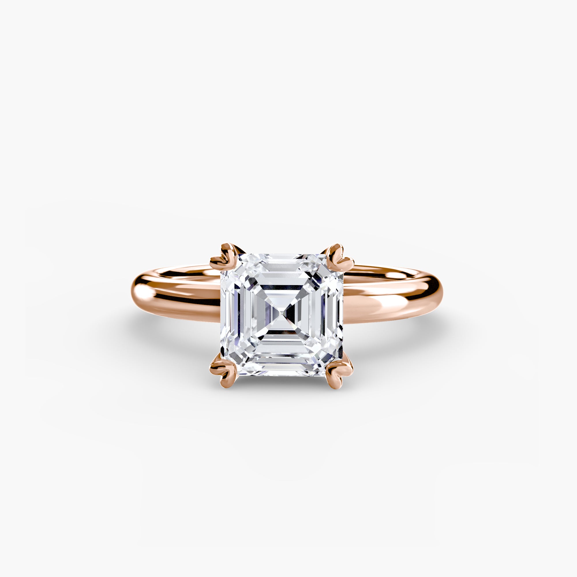The MICHAEL ISAAC Solitaire ring 2 showcases an asscher-cut diamond in a rose gold four-prong solitaire setting, presented on a plain white background for a timeless minimalist look.