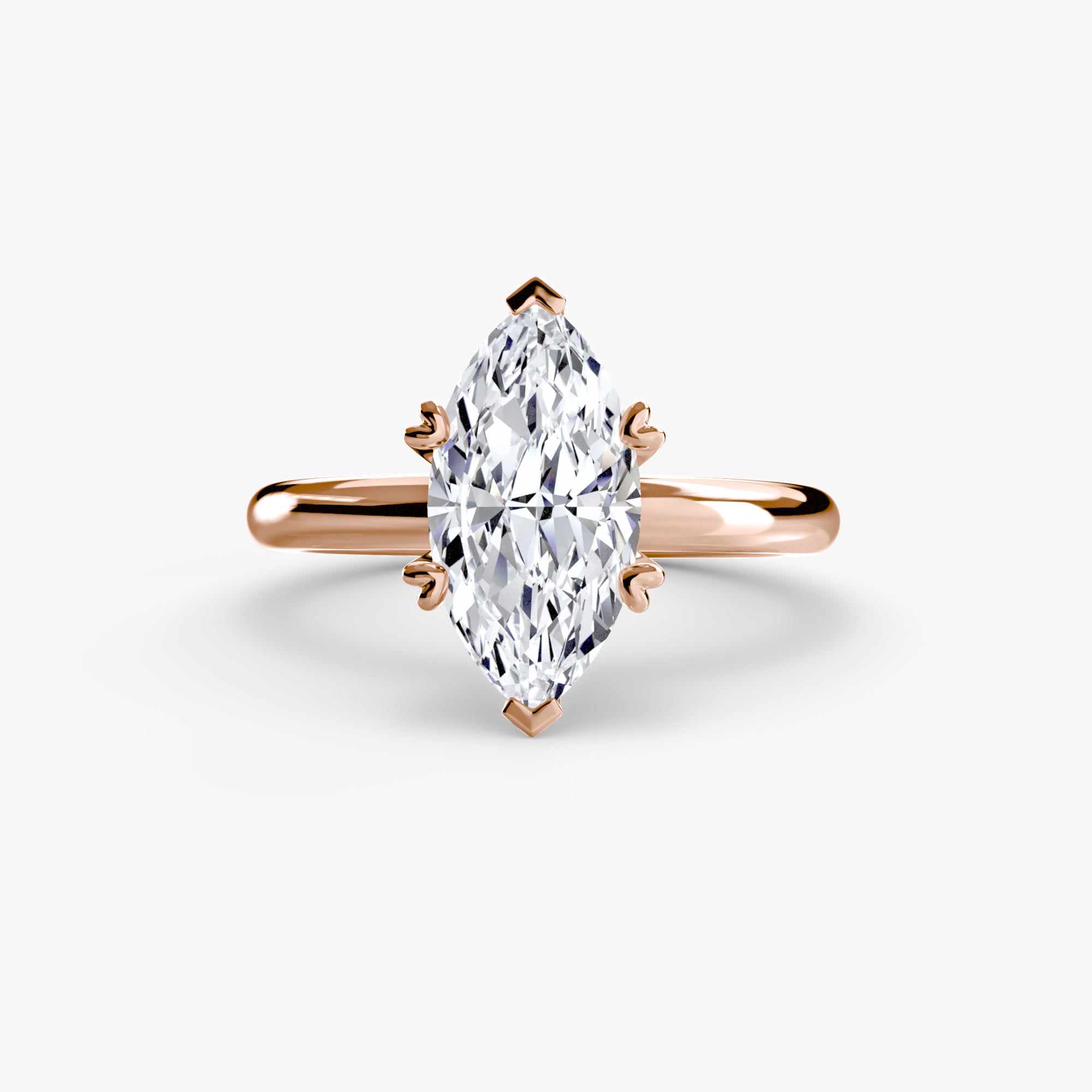 The MICHAEL ISAAC Solitaire ring 2 is a rose gold marquise-cut diamond solitaire in a classic four-prong setting, shown on a plain white background.