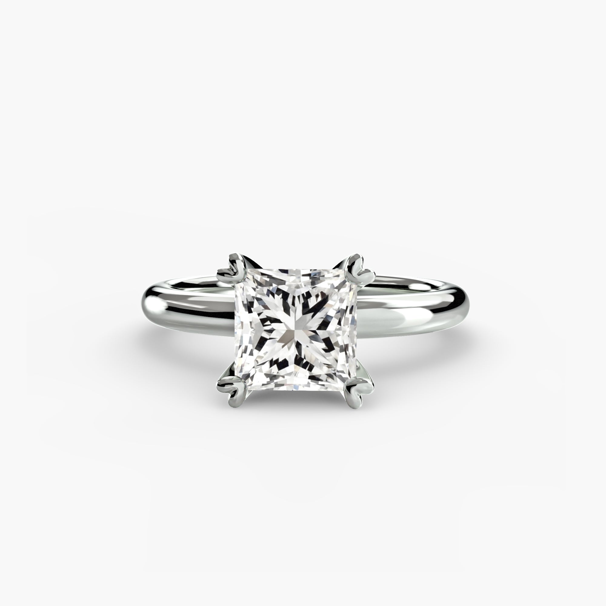The MICHAEL ISAAC Solitaire ring 2 showcases a princess-cut diamond in a classic setting on a polished silver band, elegantly displayed against a plain white background.
