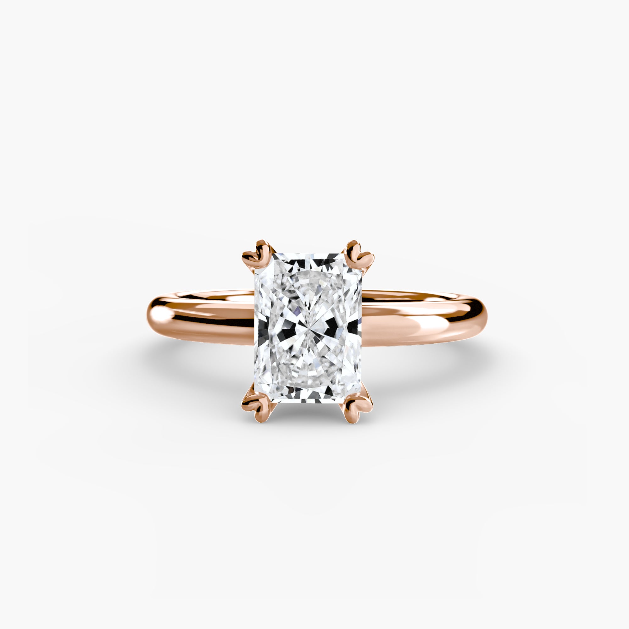 The MICHAEL ISAAC Solitaire ring 2 is a rose gold ring with a radiant-cut diamond in a four-prong classic setting, shown against a plain white background.