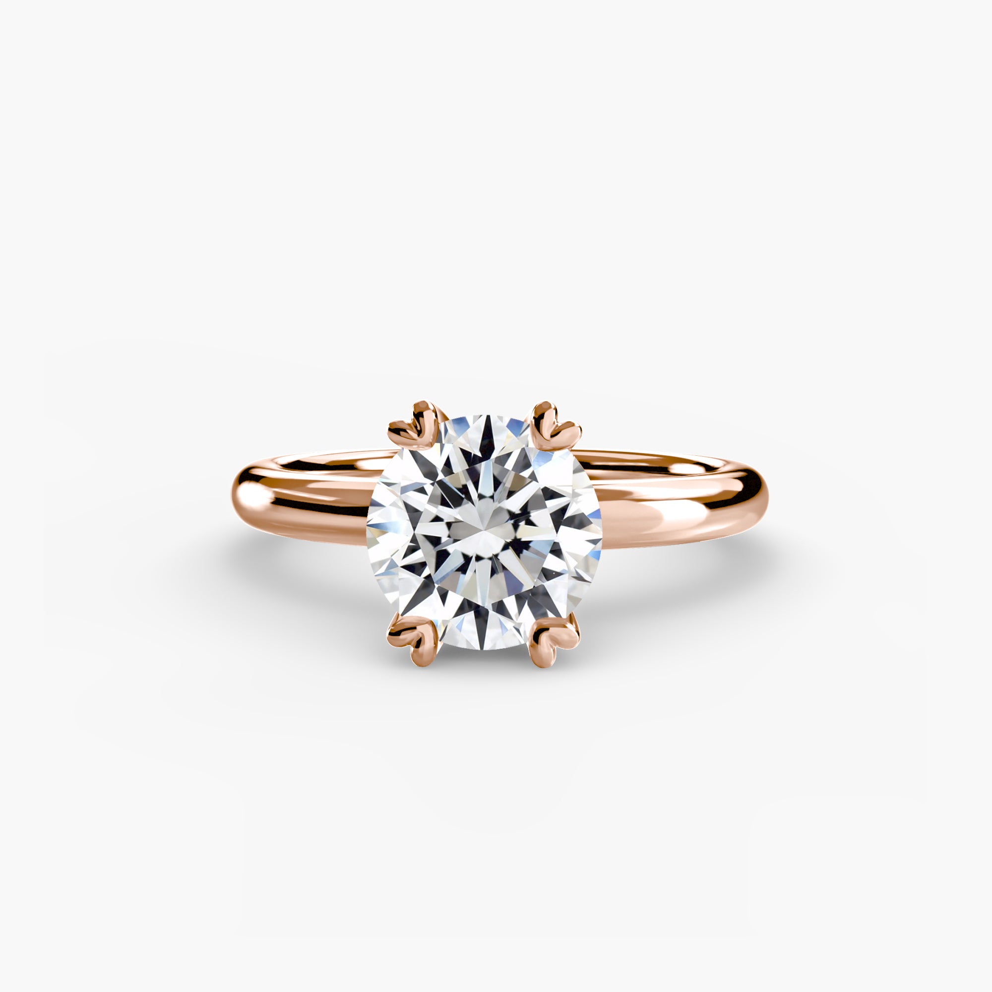 The MICHAEL ISAAC Solitaire ring 2 is a rose gold ring with a simple band, showcasing a large round brilliant-cut diamond in a classic four-prong setting, displayed on a plain white background.