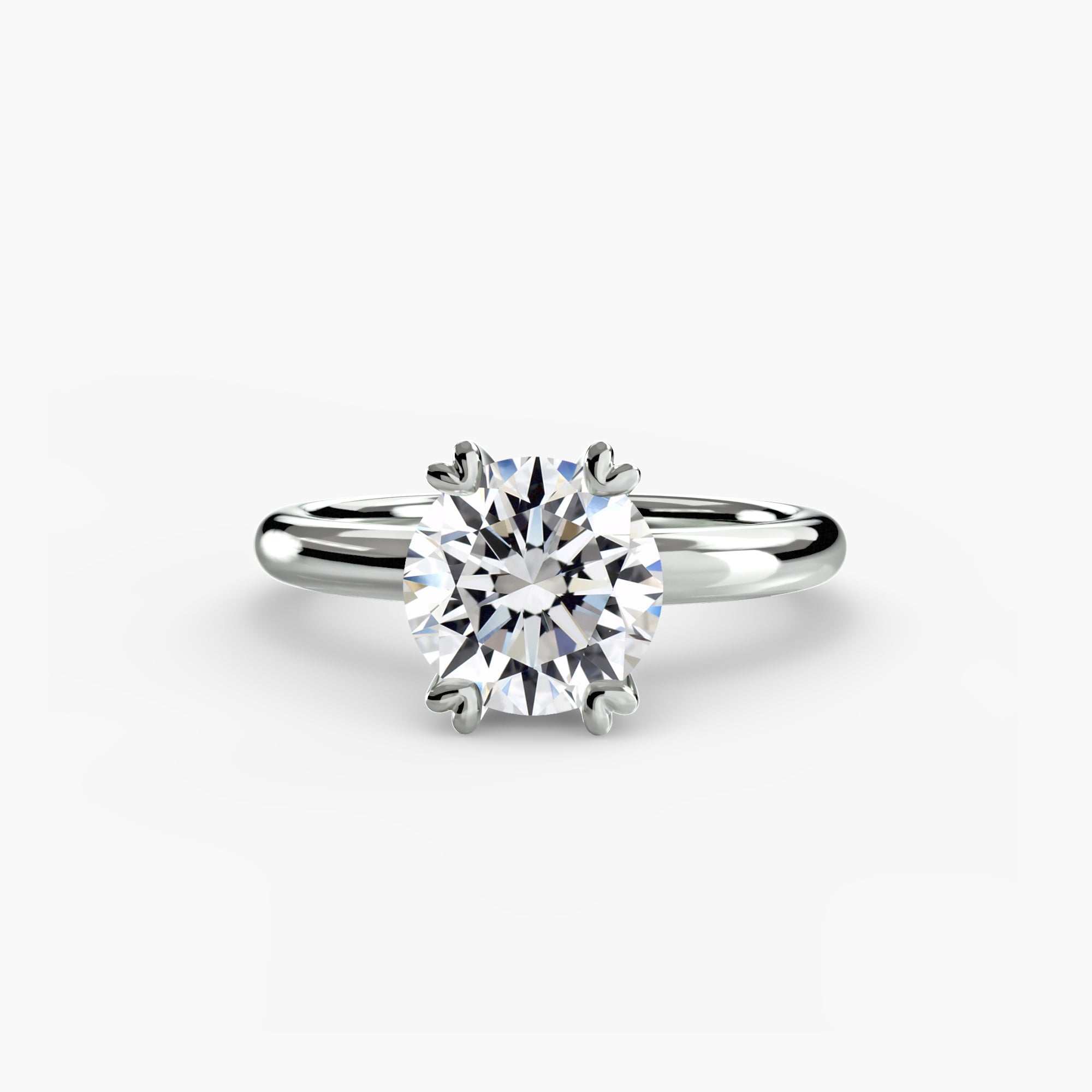 The MICHAEL ISAAC Solitaire ring 2 features a round brilliant-cut diamond in a classic six-prong silver setting, shown on a plain white background.
