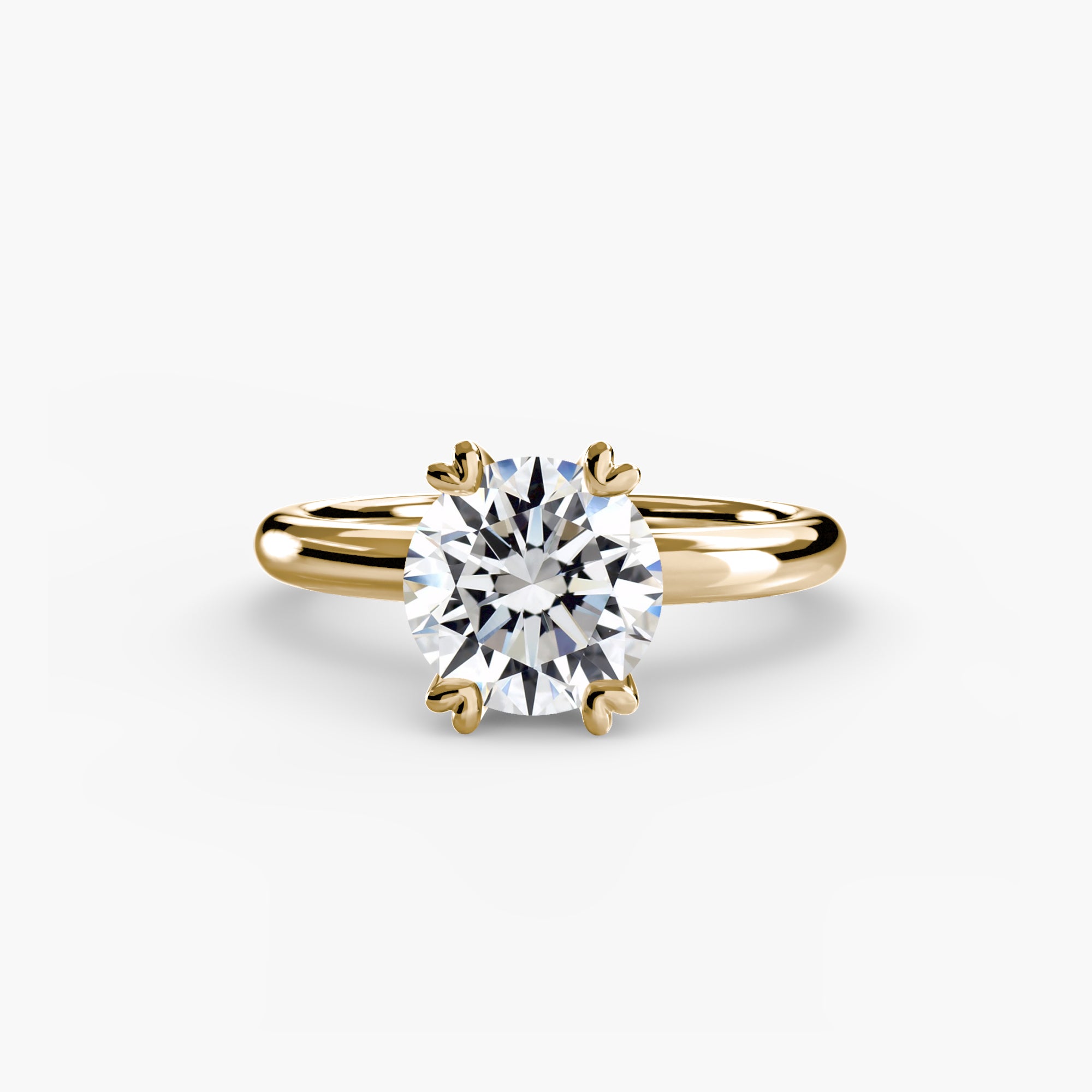 The MICHAEL ISAAC Solitaire ring 2 features a round, brilliant-cut diamond in a classic six-prong setting against a white background—a timeless, minimalist choice.