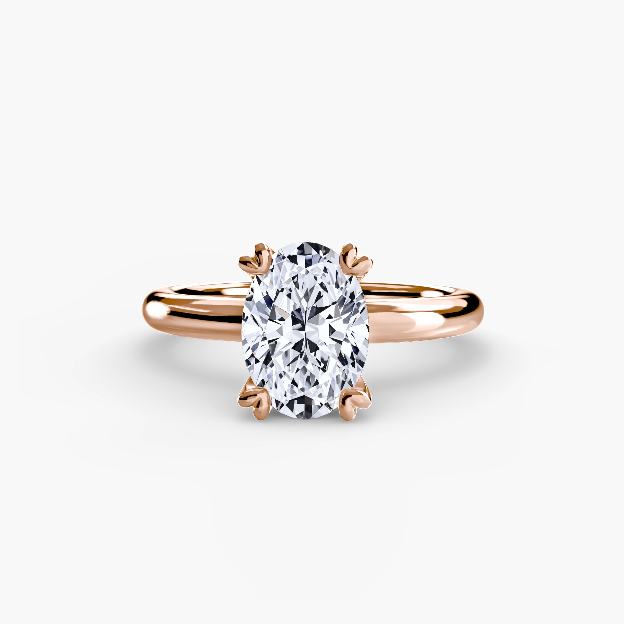 The MICHAEL ISAAC Solitaire ring 2 features a large oval-cut diamond in a classic solitaire setting on a minimalist rose gold band, shown against a plain white background.
