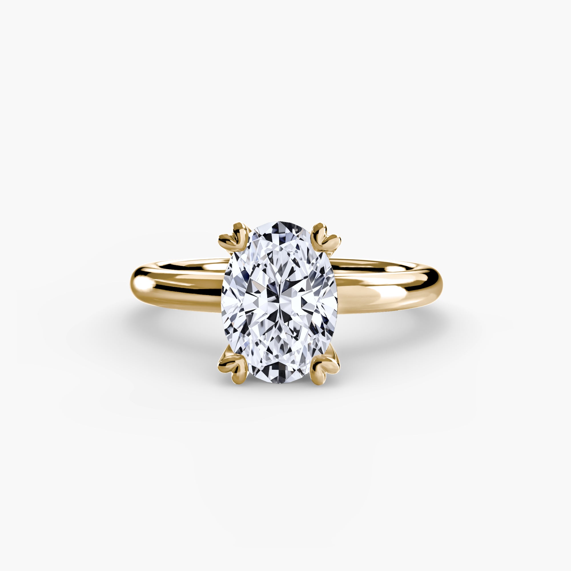 The MICHAEL ISAAC Solitaire ring 2 features a large oval-cut diamond in a classic four-prong gold setting, shown on a plain white background. This minimalist ring embodies timeless, understated elegance.