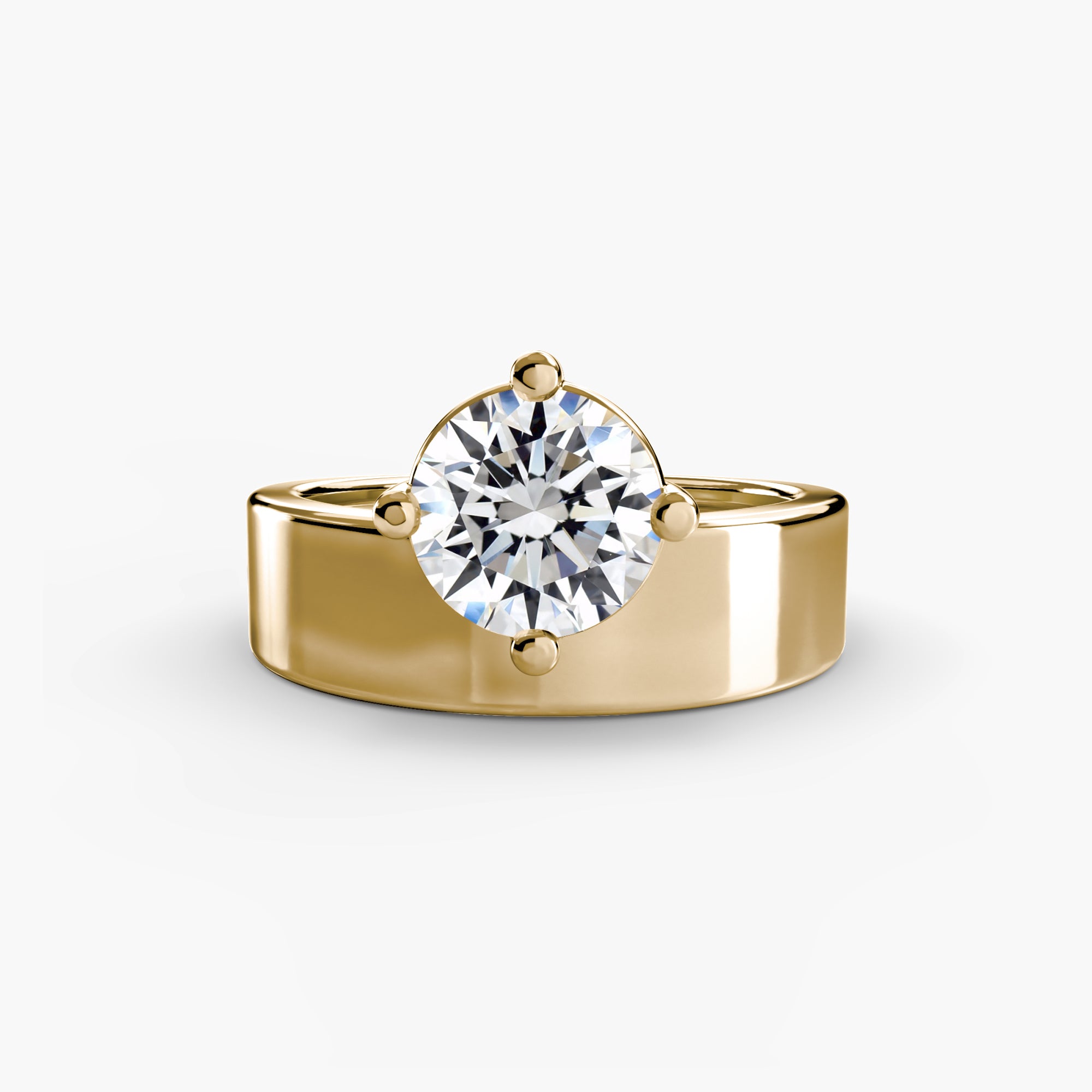 The MICHAEL ISAAC Wide Band Solitaire showcases a large, round brilliant-cut center stone in four prongs atop a wide gold band, displayed on a plain white background.