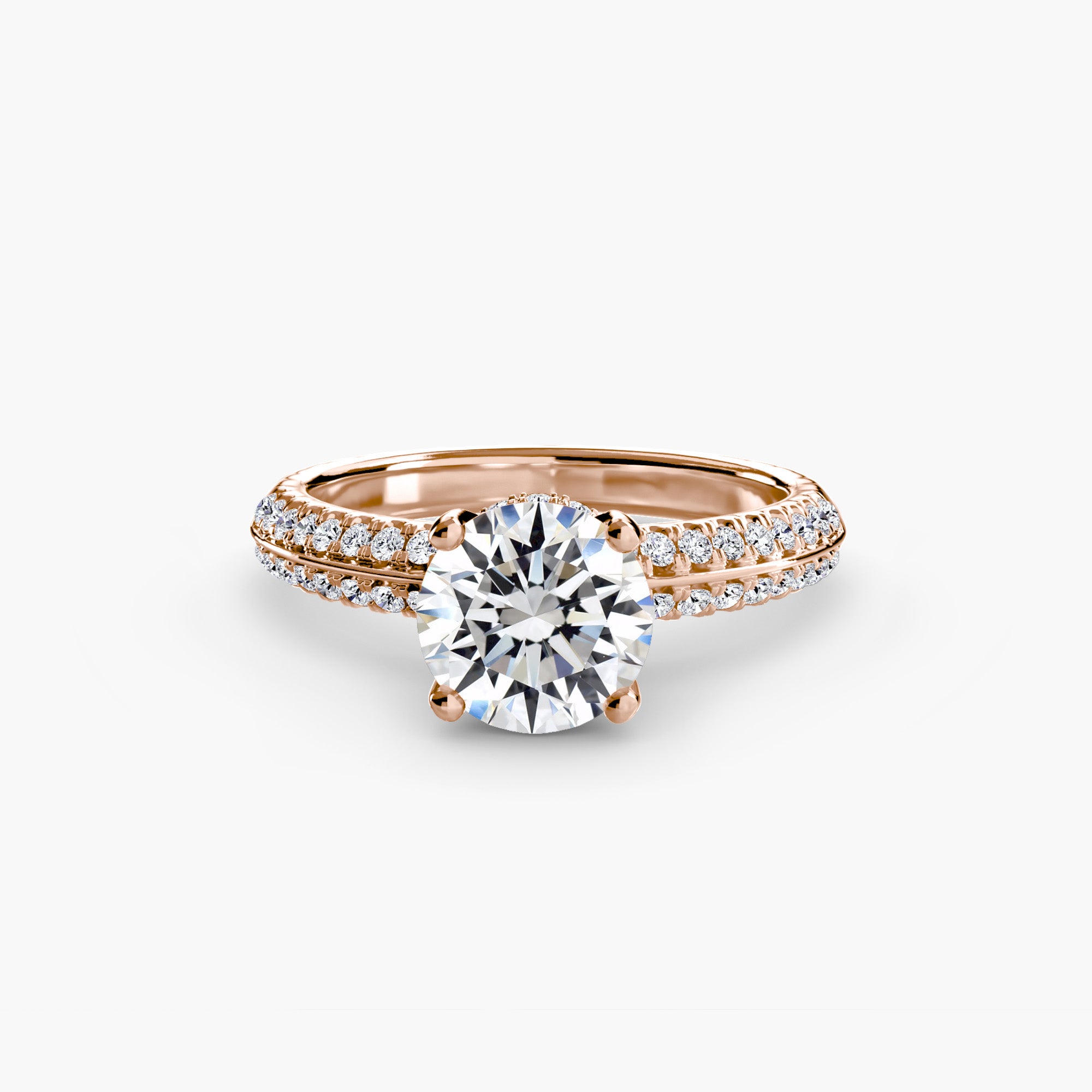 The MICHAEL ISAAC Solitaire with Pavé is a rose gold engagement ring featuring a large round center diamond and pavé-set bands adorned with smaller diamonds, exuding everyday luxury, shown on a white background.