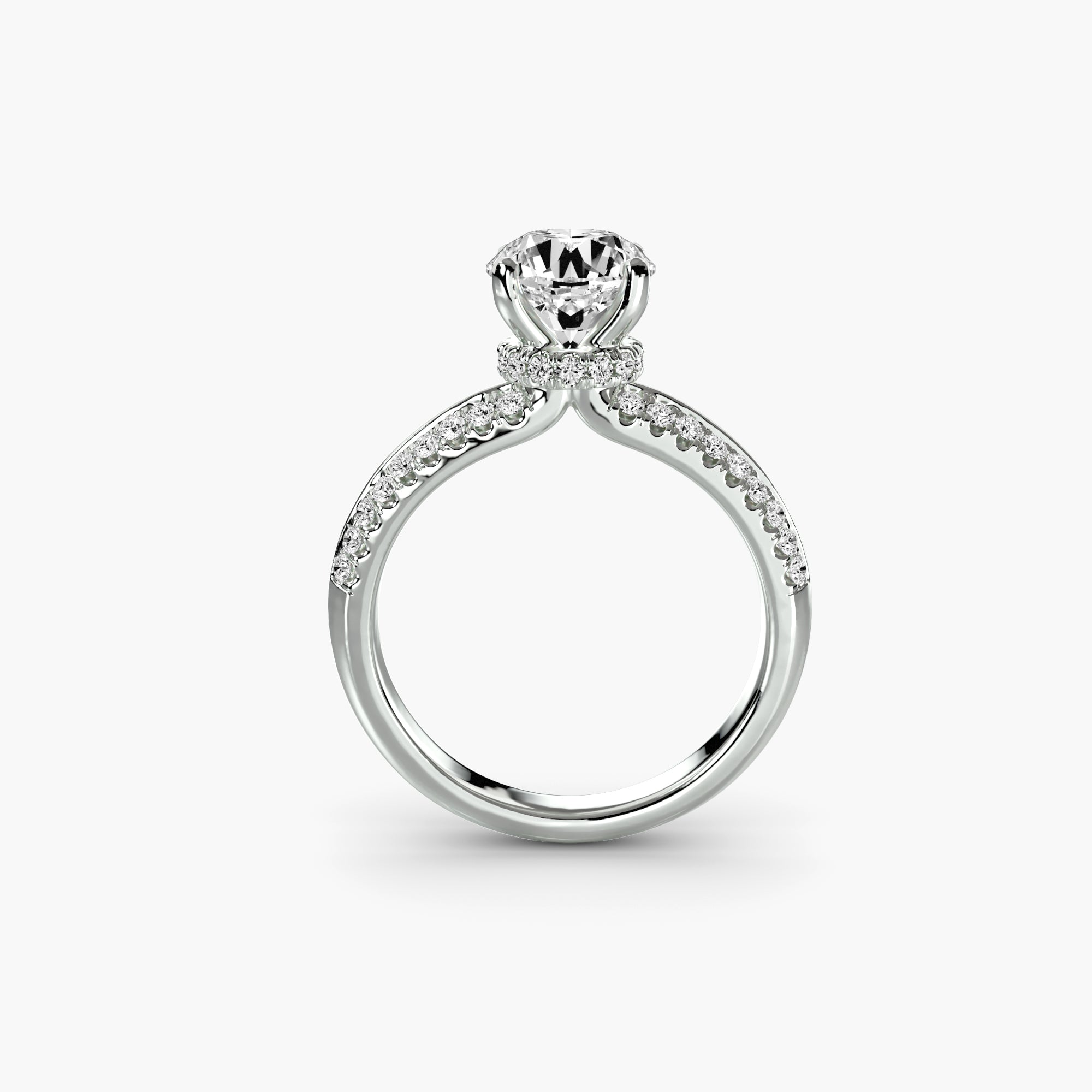 The Solitaire with Pavé ring by MICHAEL ISAAC features a large round-cut diamond centerpiece and a pavé-set band, shown upright on a plain white background—an ideal choice for effortless, everyday luxury.