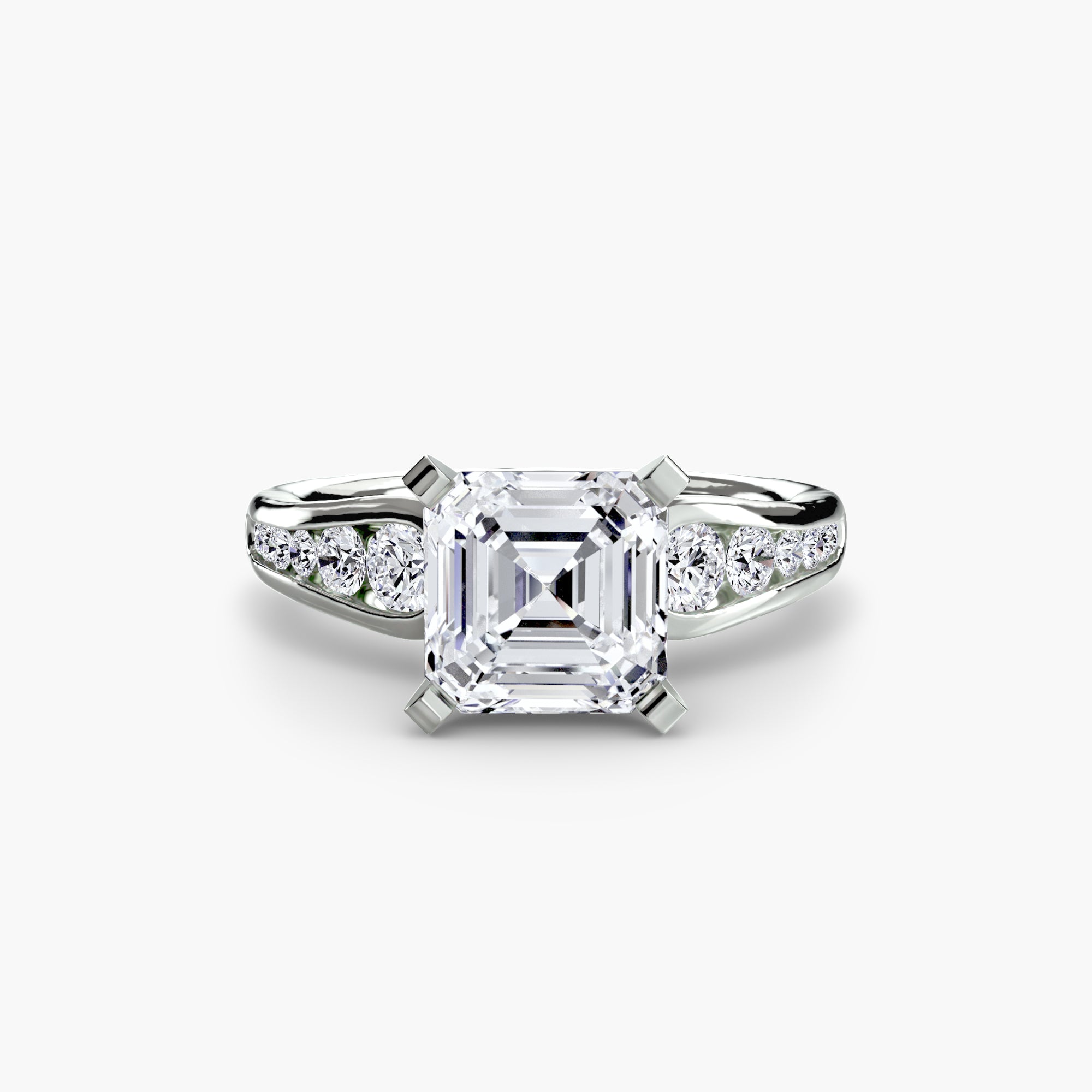 The MICHAEL ISAAC Solitaire with Pavé 2 features a large, square-cut diamond in four prongs and a platinum band adorned with pavé-set round diamonds, bringing everyday luxury to this sparkling solitaire ring.