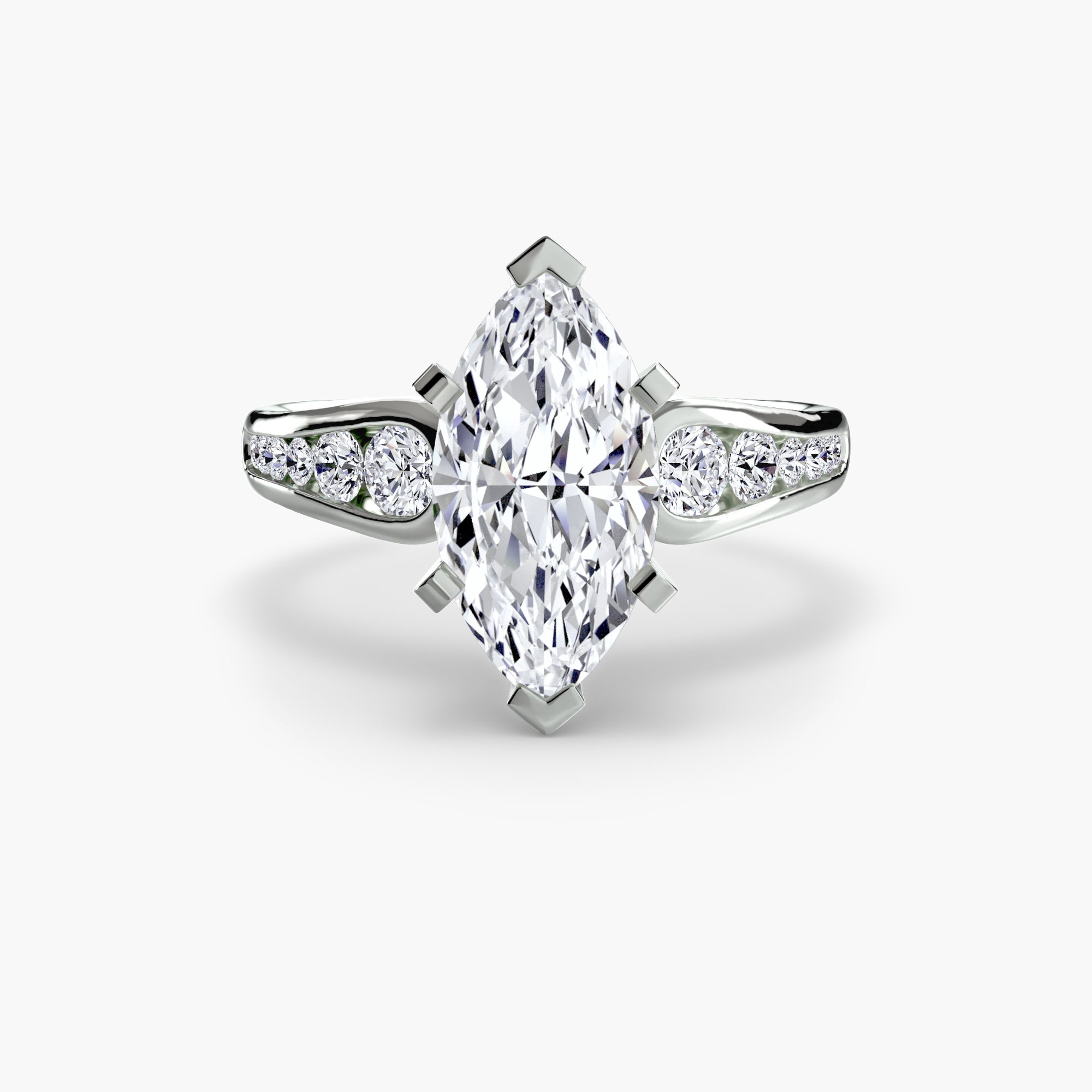 The MICHAEL ISAAC Solitaire with Pavé 2 is a silver ring featuring a large marquise-cut diamond center and pavé-set round diamonds on the band, adding a touch of everyday luxury.