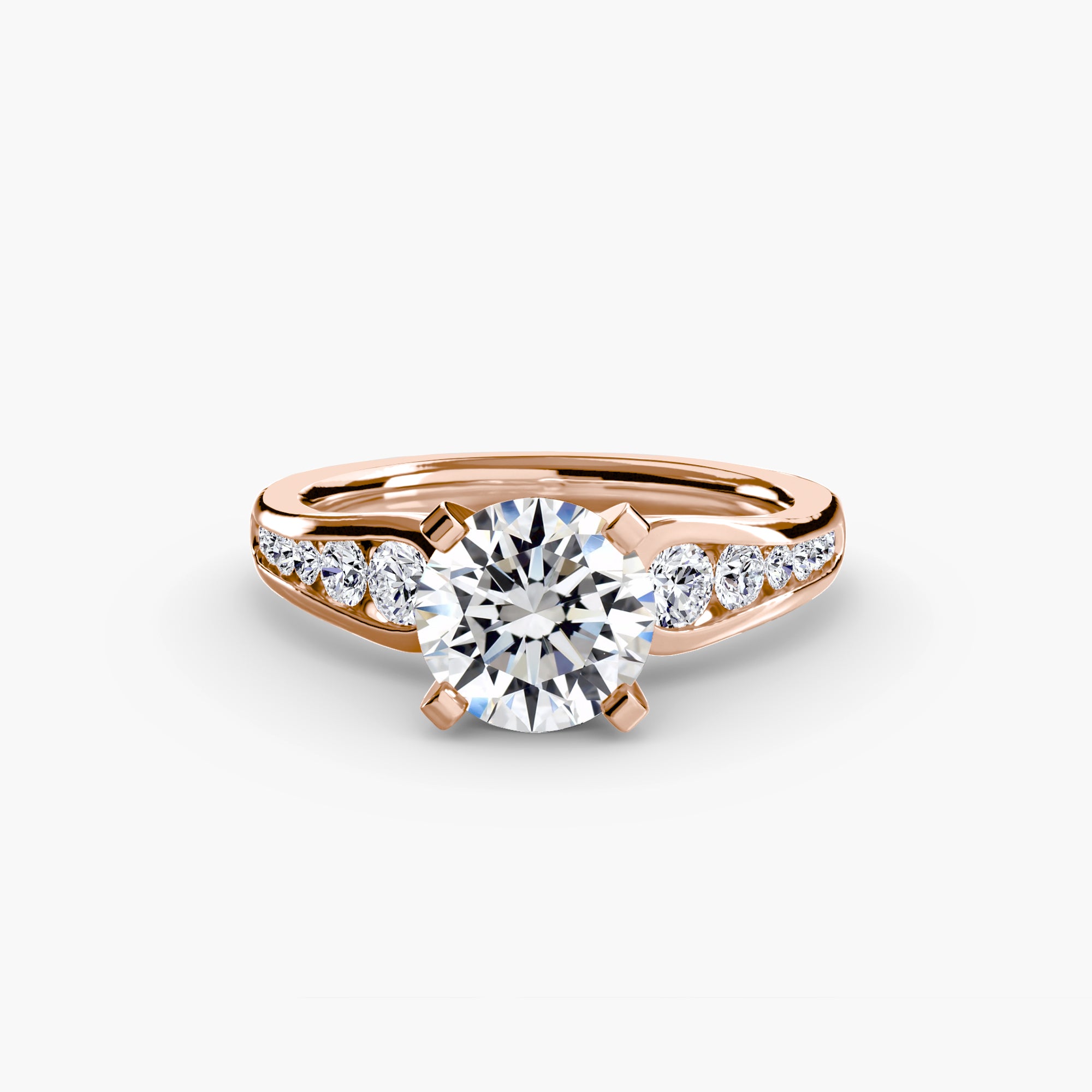 The MICHAEL ISAAC Solitaire with Pavé 2 features a rose gold band with a large round center diamond and pavé-set diamonds along each side, showcased on a white background—an exquisite piece of everyday luxury.