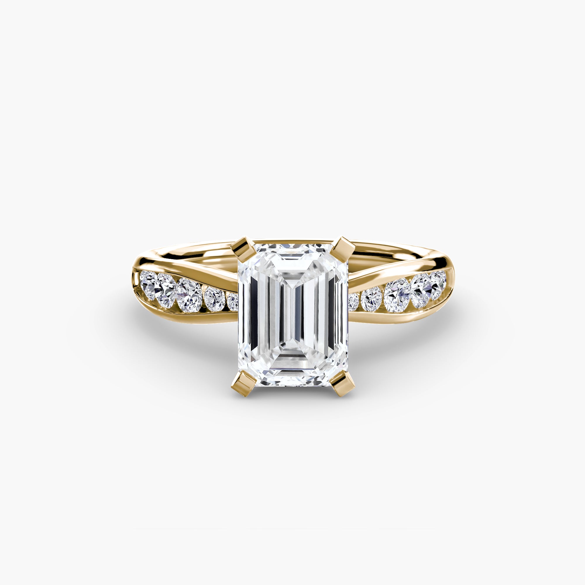 The Solitaire with Pavé 3 by MICHAEL ISAAC features a gold band with a central emerald-cut diamond and pavé-set round diamonds, offering an elegant touch of everyday luxury.