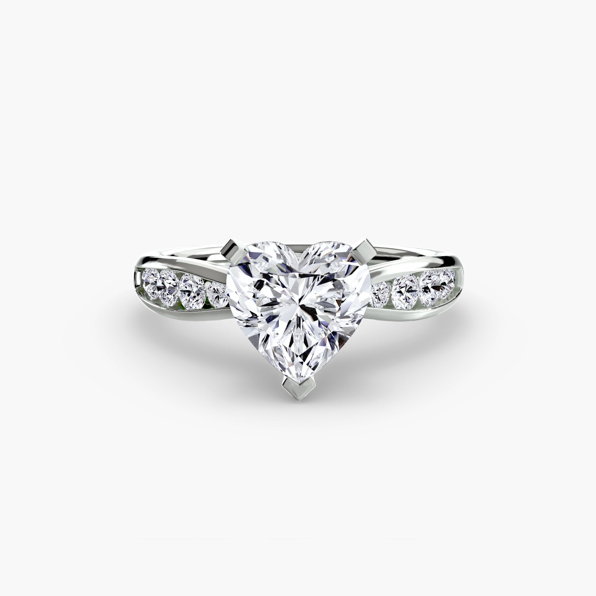 The MICHAEL ISAAC Solitaire with Pavé 3 ring showcases a large heart-shaped diamond center and pavé-set round diamonds on the band, displayed on a white background—an elegant touch for any look.