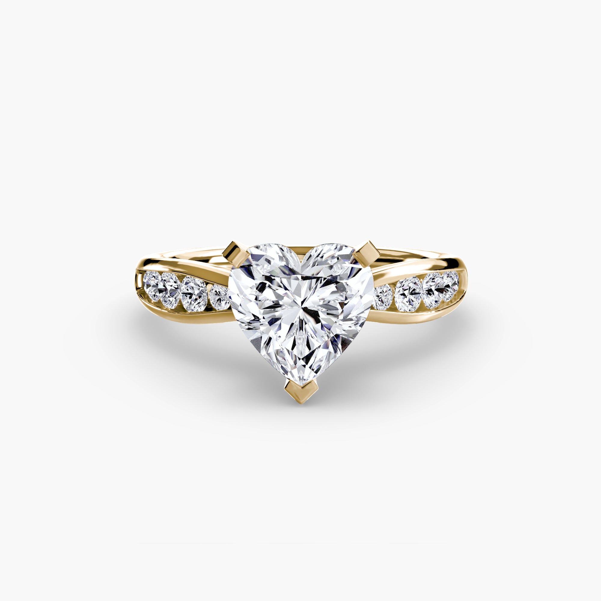 The MICHAEL ISAAC Solitaire with Pavé 3 ring showcases a heart-shaped center diamond and pavé-set round diamonds on a split shank band, displayed on a white background—an expression of everyday luxury.