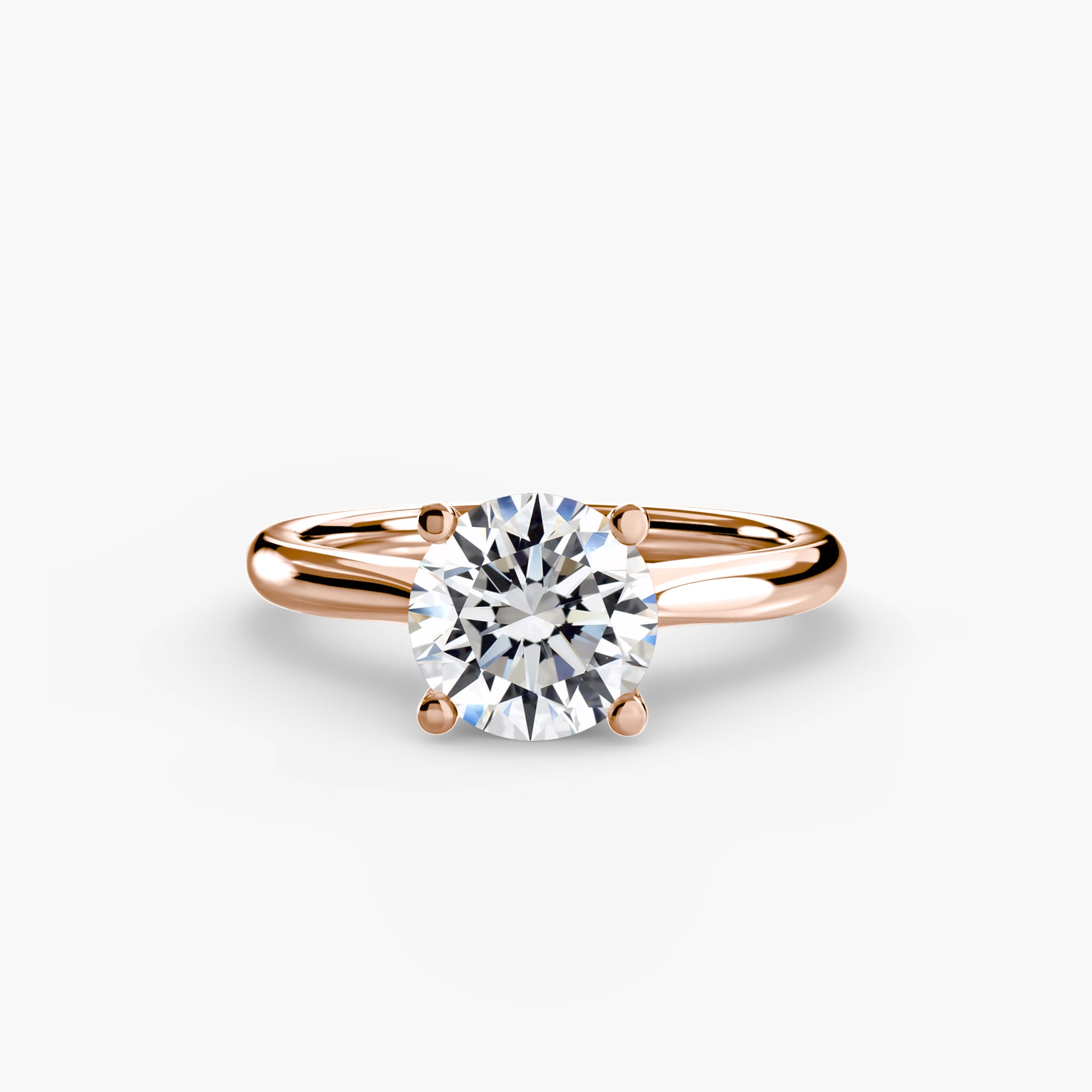 The MICHAEL ISAAC Solitaire ring 3 is a rose gold minimalist ring featuring a large round diamond in a classic solitaire setting, shown on a plain white background.