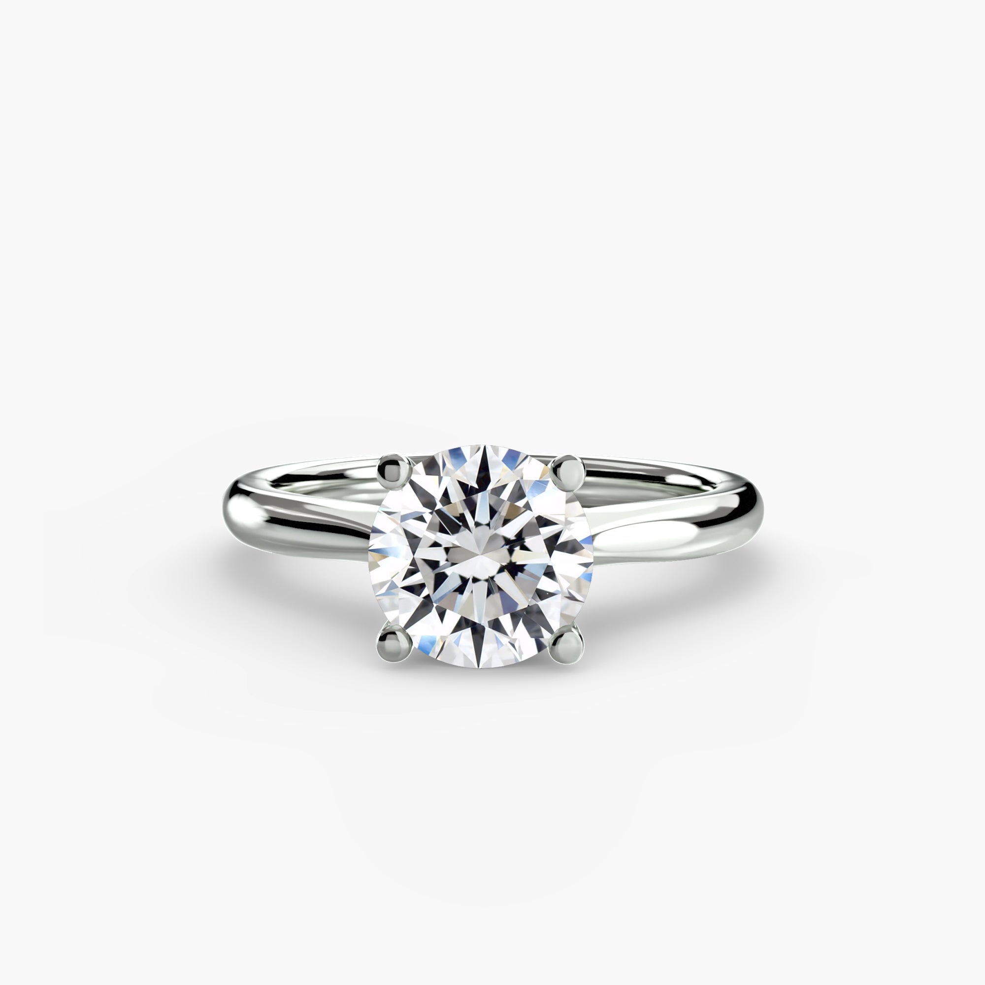 The MICHAEL ISAAC Solitaire ring 3 is a silver solitaire ring with a large round-cut diamond in a classic four-prong setting, shown on a plain white background.