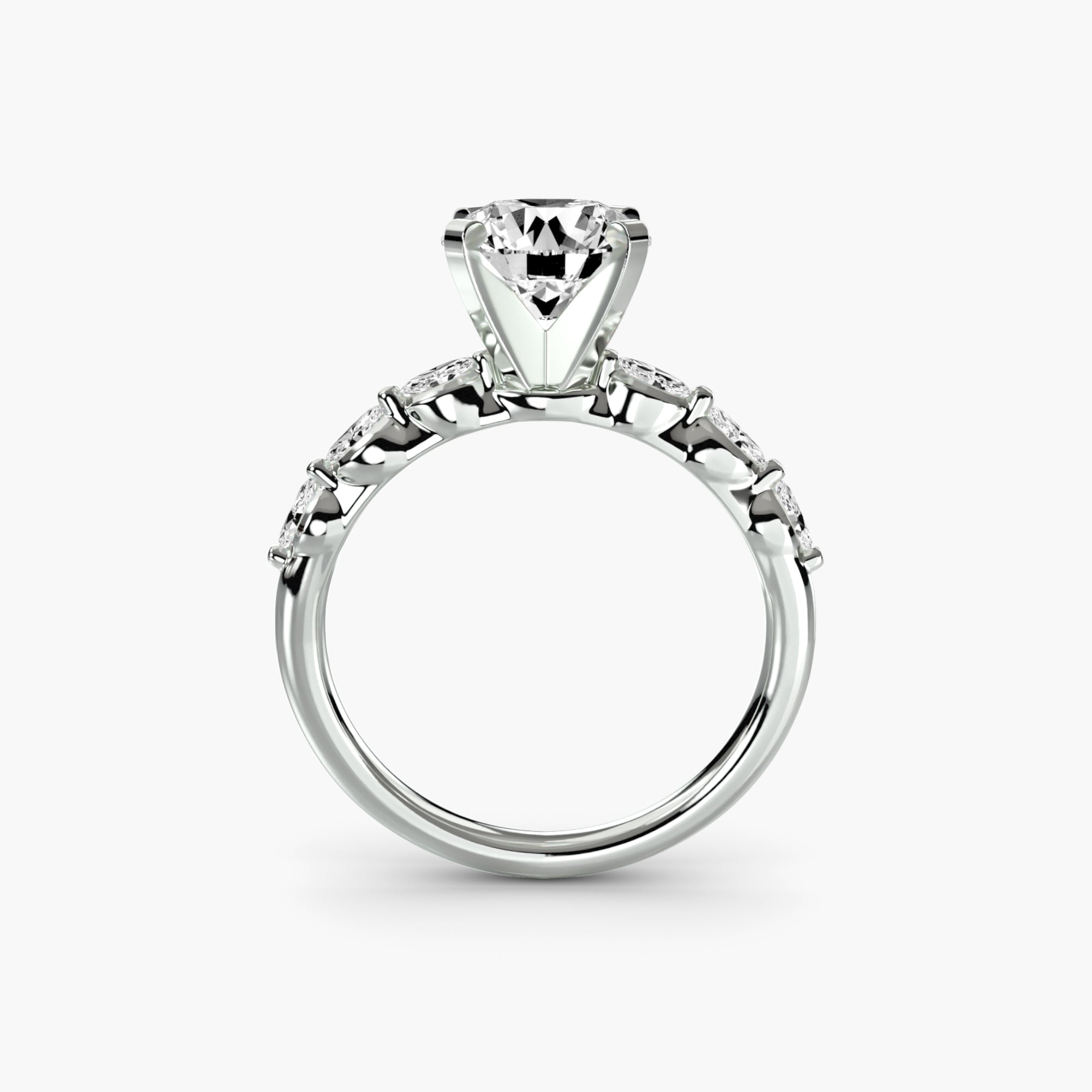 An elegant engagement ring, The Floral Accent Solitaire by MICHAEL ISAAC features a large round diamond center stone with sparkling side diamonds set in platinum, shown against a white background.