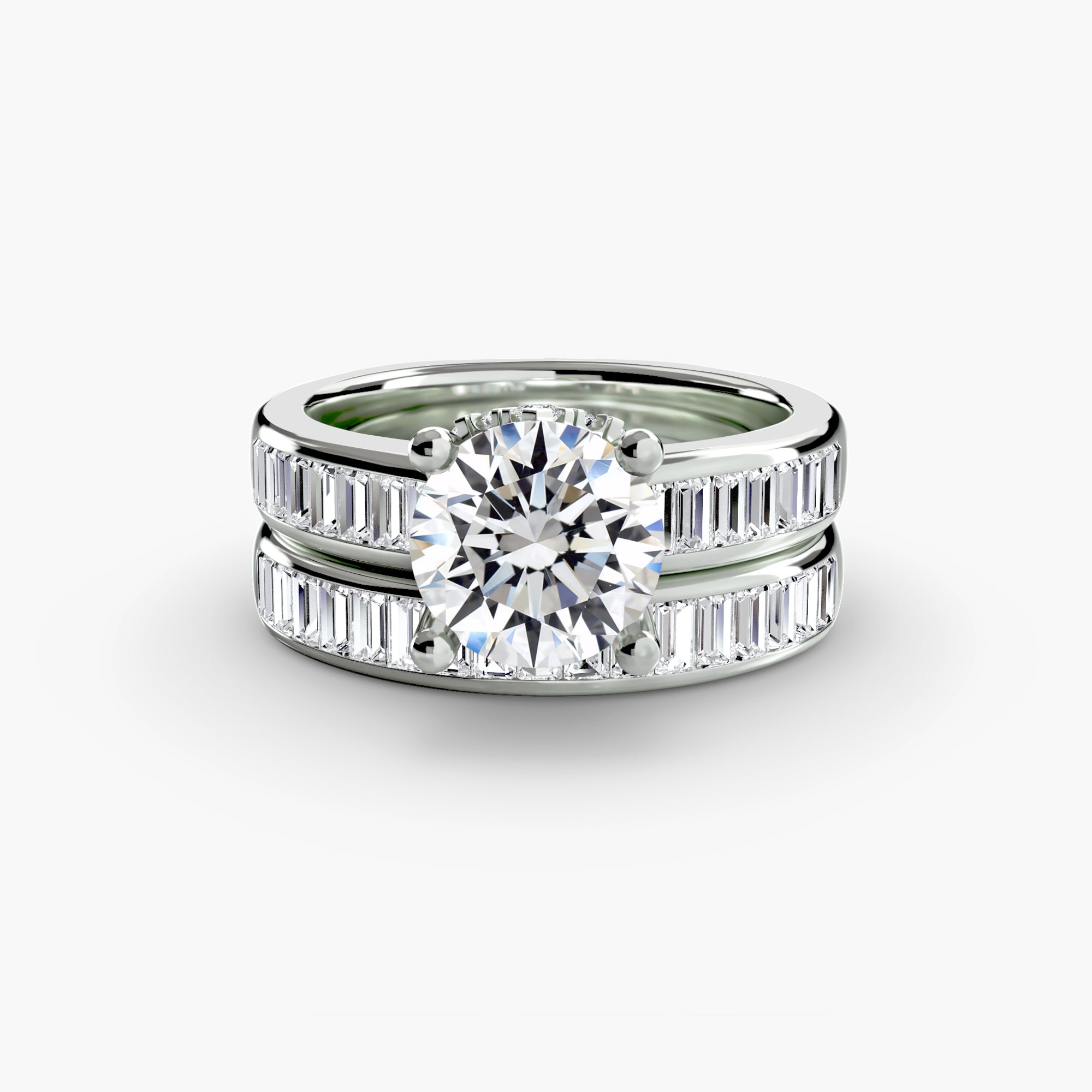 The MICHAEL ISAAC Baguette Channel Solitaire set features a large round diamond centerpiece and matching band, both accented with rectangular baguette-cut side stones for classic elegance and sparkling style.
