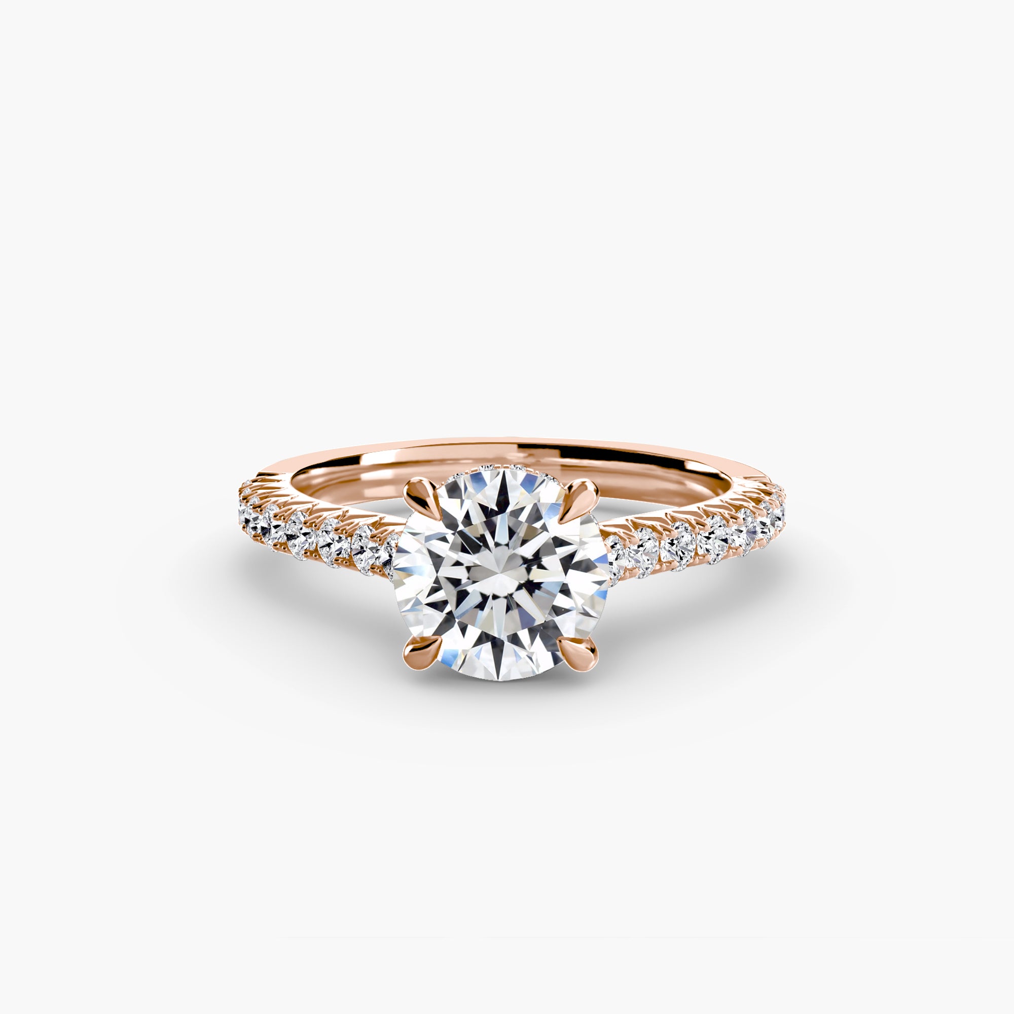 The MICHAEL ISAAC Solitaire with Pavé 5 is a rose gold ring showcasing a large round diamond in a four-prong setting, with pavé-set diamonds along the band, displayed on a white background.